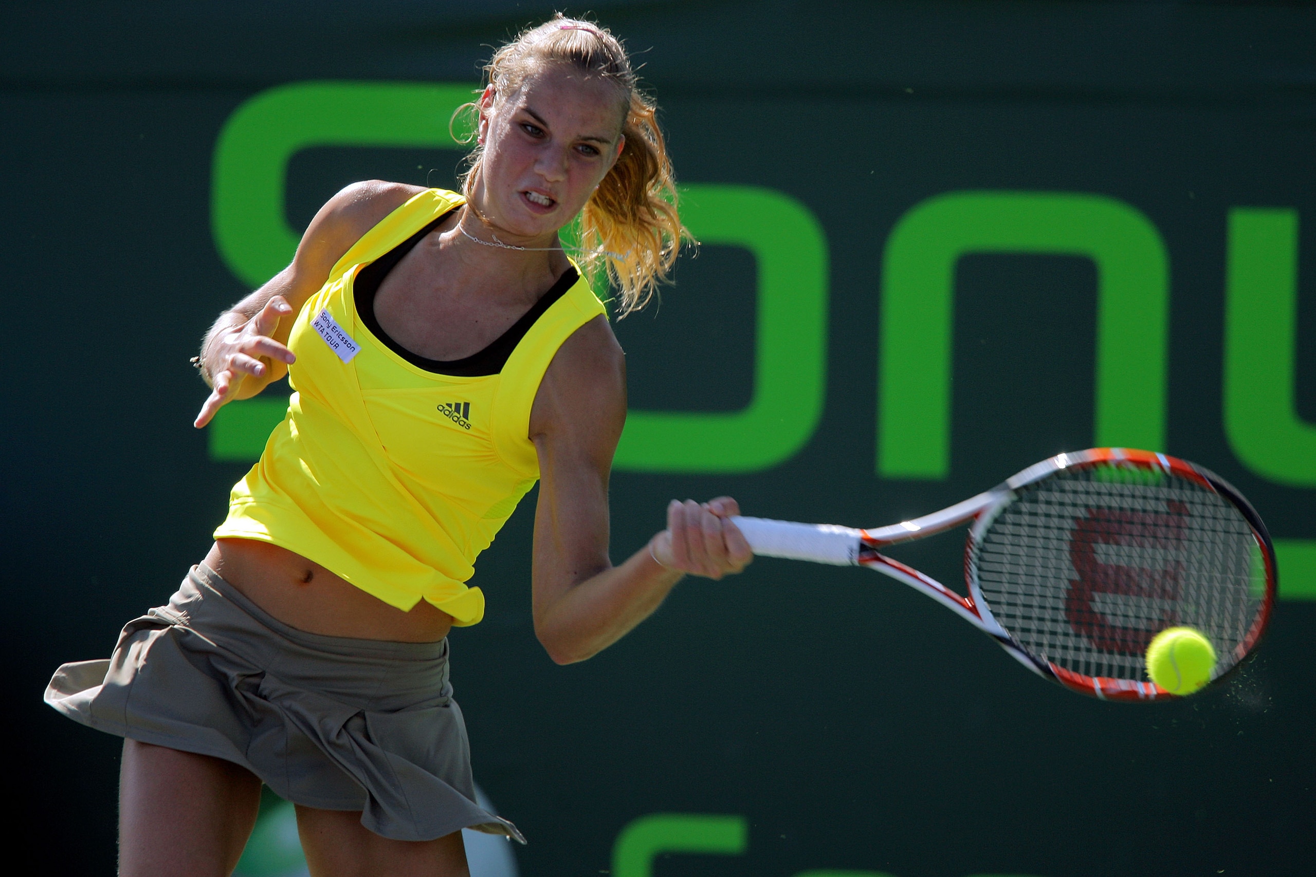 KEY BISCAYNE, FL - MARCH 25:  Arantxa Rus of Netherlands returns a shot against Magdalena Rybarikova of Slovakia during day three of the Sony Ericsson Open at The Crandon Park Tennis Center on March 25, 2009 in Key Biscayne, Florida.  (Photo by Matthew St