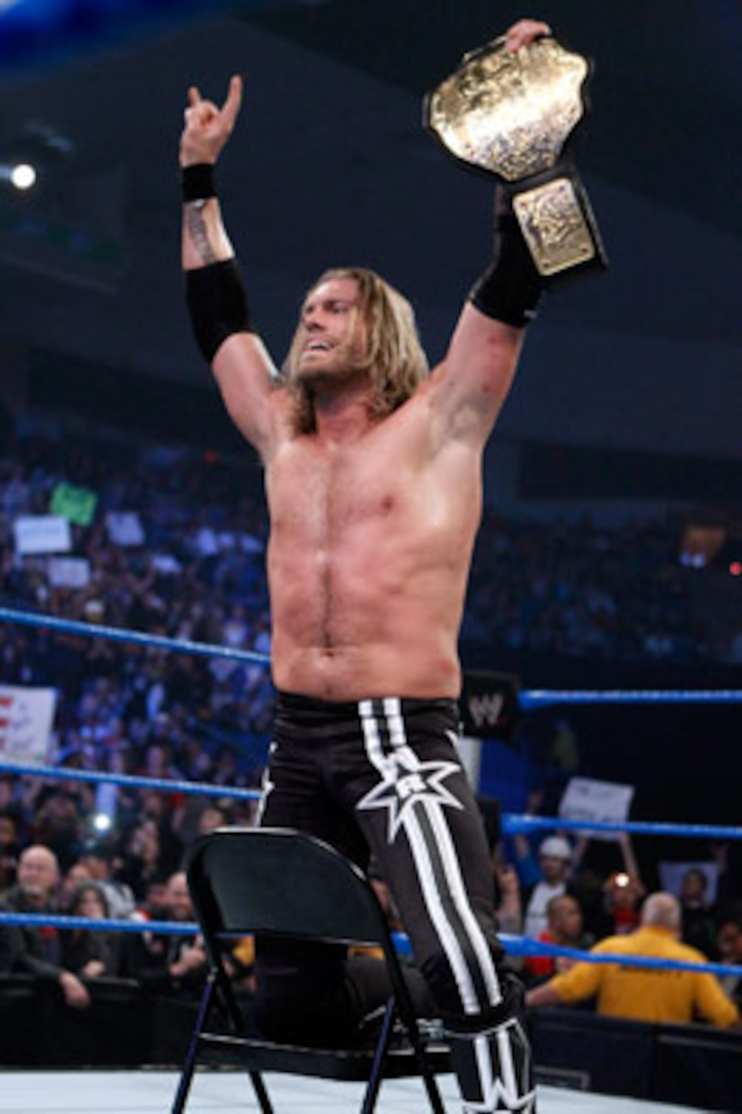 Edge with the World title, photo copyright to WWE.com