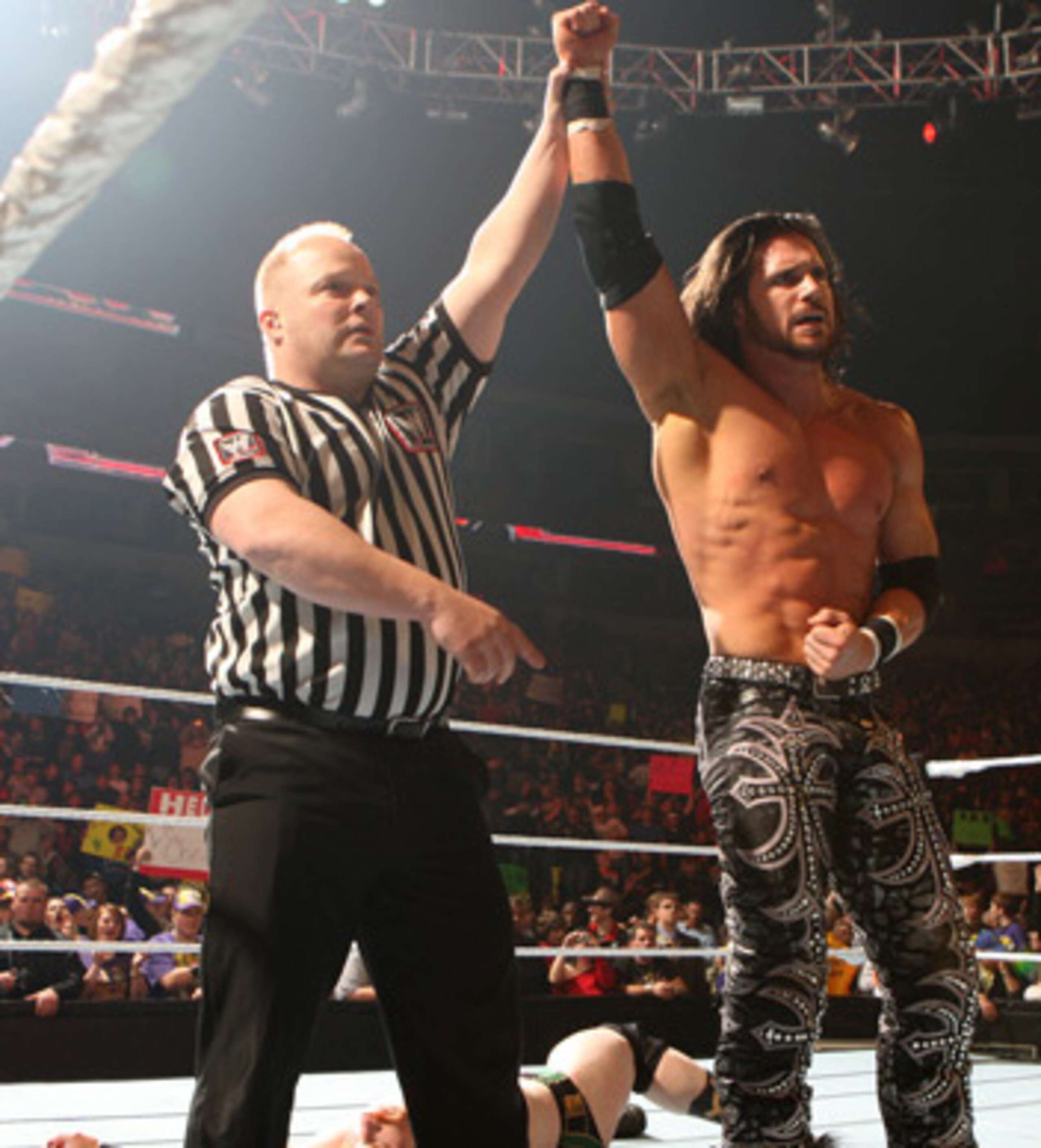 John Morrison victorious, photo copyright to WWE.com