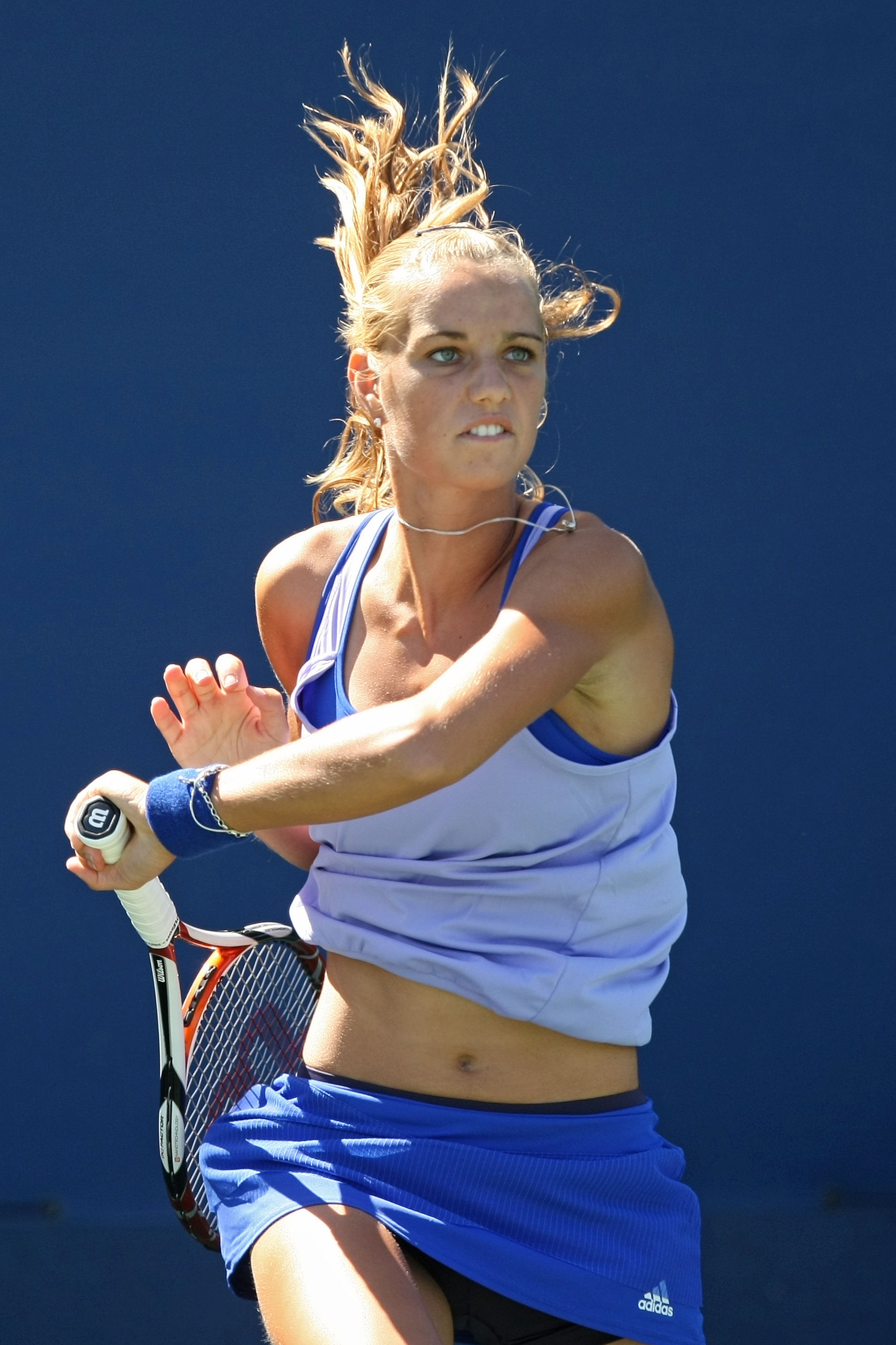 NEW YORK - SEPTEMBER 01:  Arantxa Rus of the Netherlands serves against Sara Errani of Italy during day two of the 2009 U.S. Open at the USTA Billie Jean King National Tennis Center on September 1, 2009 in Flushing neighborhood of the Queens borough of Ne