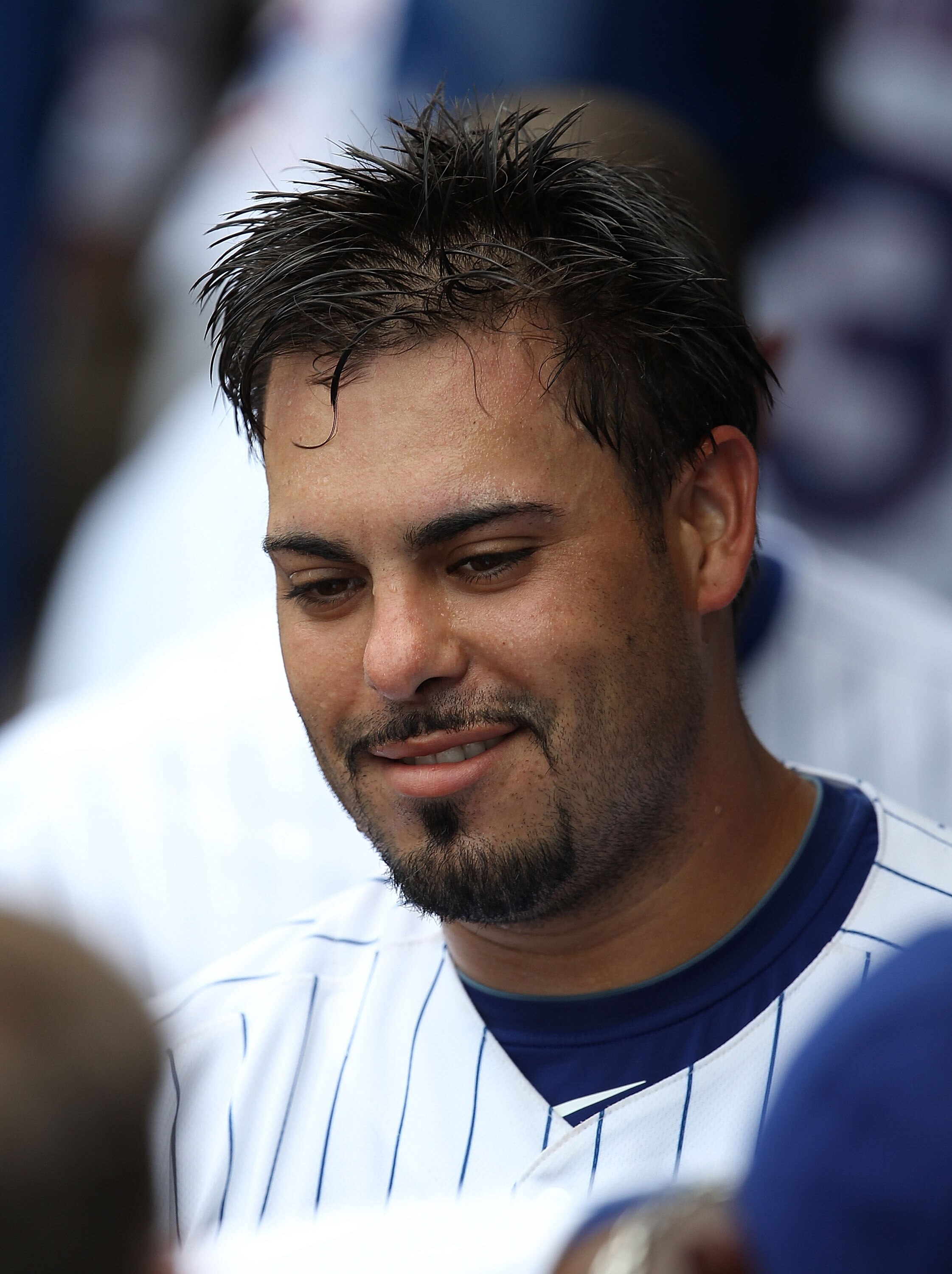 CHICAGO - SEPTEMBER 05: Geovany Soto #18 of the Chicago Cubs is greeted by teammates in the dugout after hitting a home run against the New York Mets at Wrigley Field on September 5, 2010 in Chicago, Illinois. The Mets defeated the Cubs 18-5.  (Photo by J