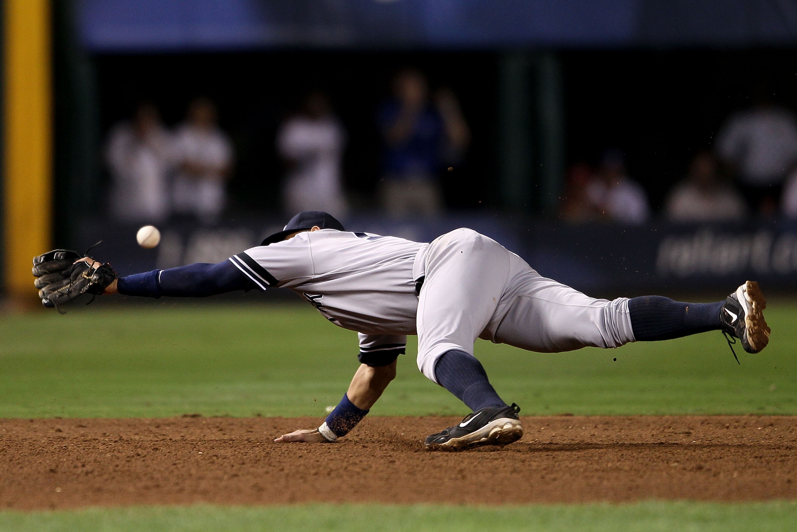 ARLINGTON, TX - OCTOBER 22:  Alex Rodriguez #13 of the New York Yankees can't make a play for a ball on defense against the Texas Ranger in Game Six of the ALCS during the 2010 MLB Playoffs at Rangers Ballpark in Arlington on October 22, 2010 in Arlington