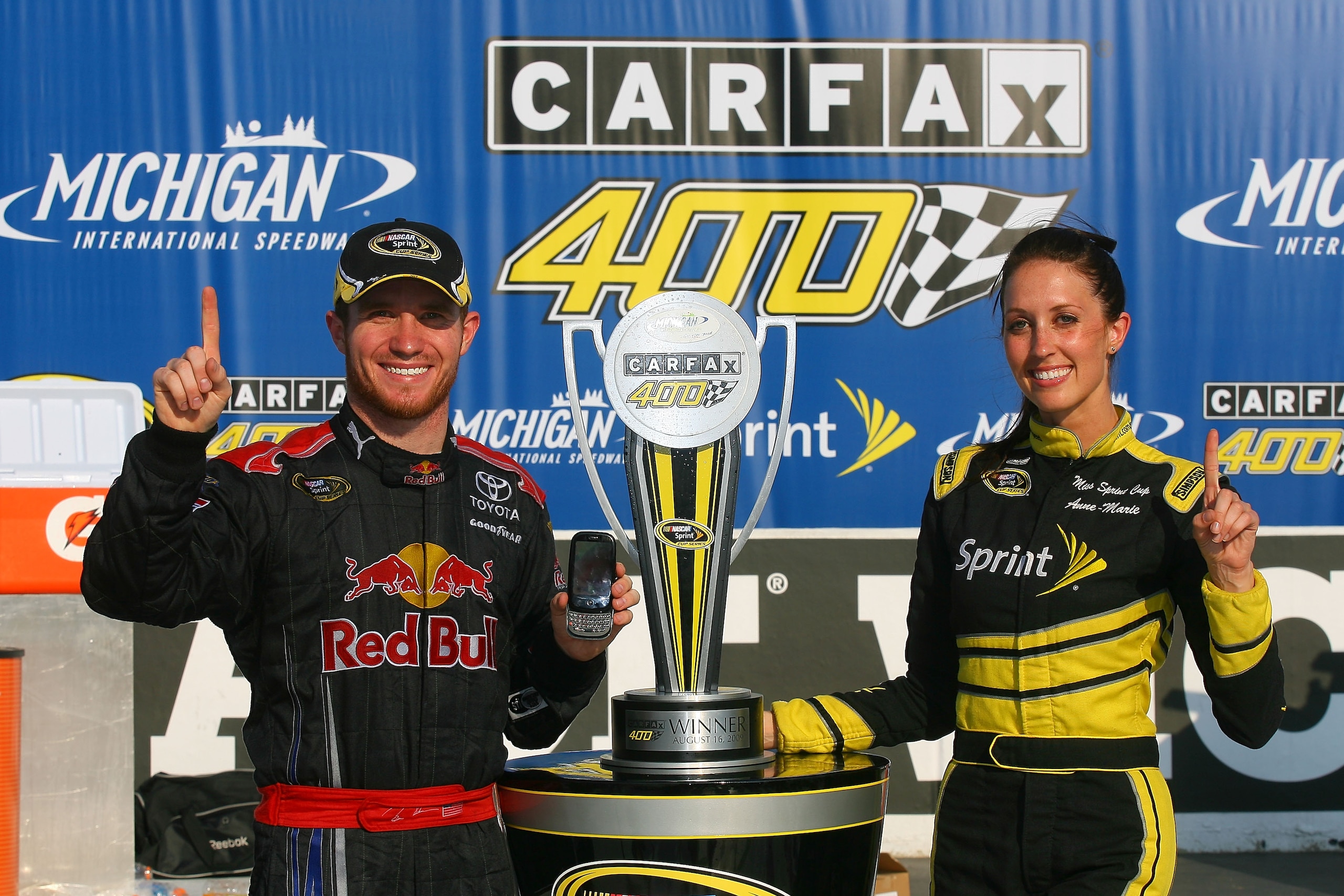 BROOKLYN, MI - AUGUST 16:  Brian Vickers, driver of the #83 Red Bull Toyota, celebrates in victory lane after winning the NASCAR Sprint Cup Series CARFAX 400 at Michigan International Speedway on August 16, 2009 in Brooklyn, Michigan.  (Photo by Jason Smi