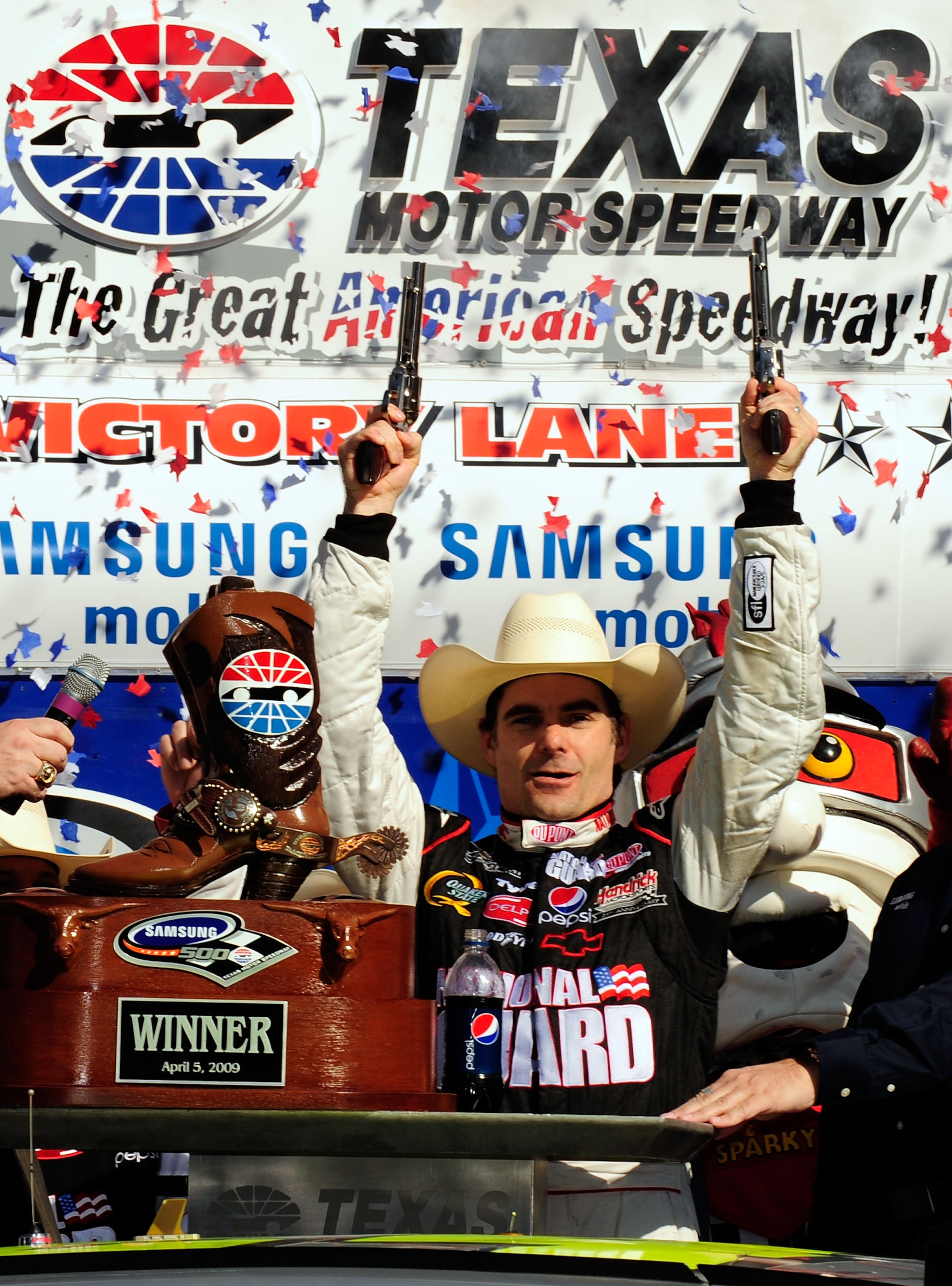 FORT WORTH, TX - APRIL 05:  Jeff Gordon, driver of the #24 DuPont Chevrolet, celebrates in victory lane after winning the NASCAR Sprint Cup Series Samsung 500 at Texas Motor Speedway on April 5, 2009 in Fort Worth, Texas.  (Photo by Rusty Jarrett/Getty Im