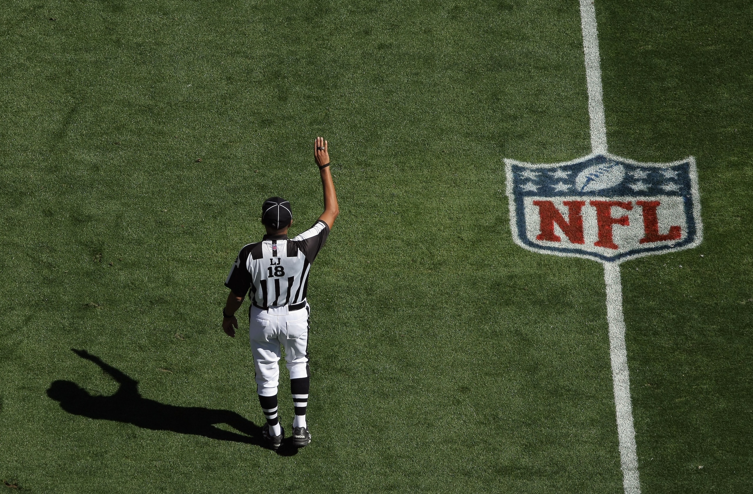 DENVER - SEPTEMBER 19: Line judge Byron Boston oversees the action as the Seattle Seahawks face the Denver Broncos at INVESCO Field at Mile High on September 19, 2010 in Denver, Colorado The Broncos defeated the Seahawks 31-14.. (Photo by Doug Pensinger DENVER - SEPTEMBER 19: Line judge Byron Boston oversees the action as the Seattle Seahawks face the Denver Broncos at INVESCO Field at Mile High on September 19, 2010 in Denver, Colorado The Broncos defeated the Seahawks 31-14.. (Photo by Doug Pensinger