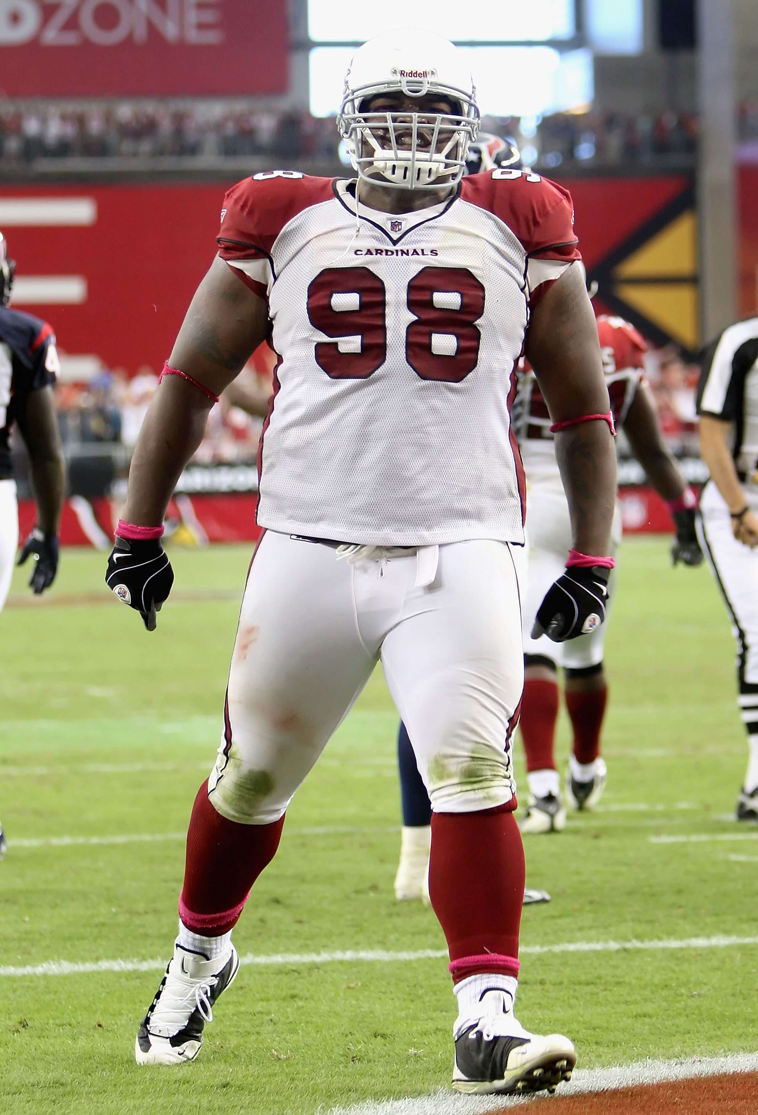 GLENDALE, AZ - OCTOBER 11: Defensive tackle Gabe Watson #98 of the Arizona Cardinals celebrates after stopping the Houston Texans on a fourth and goal during the final moments of the NFL game at the Universtity of Phoenix Stadium on October 11, 2009 in Gl