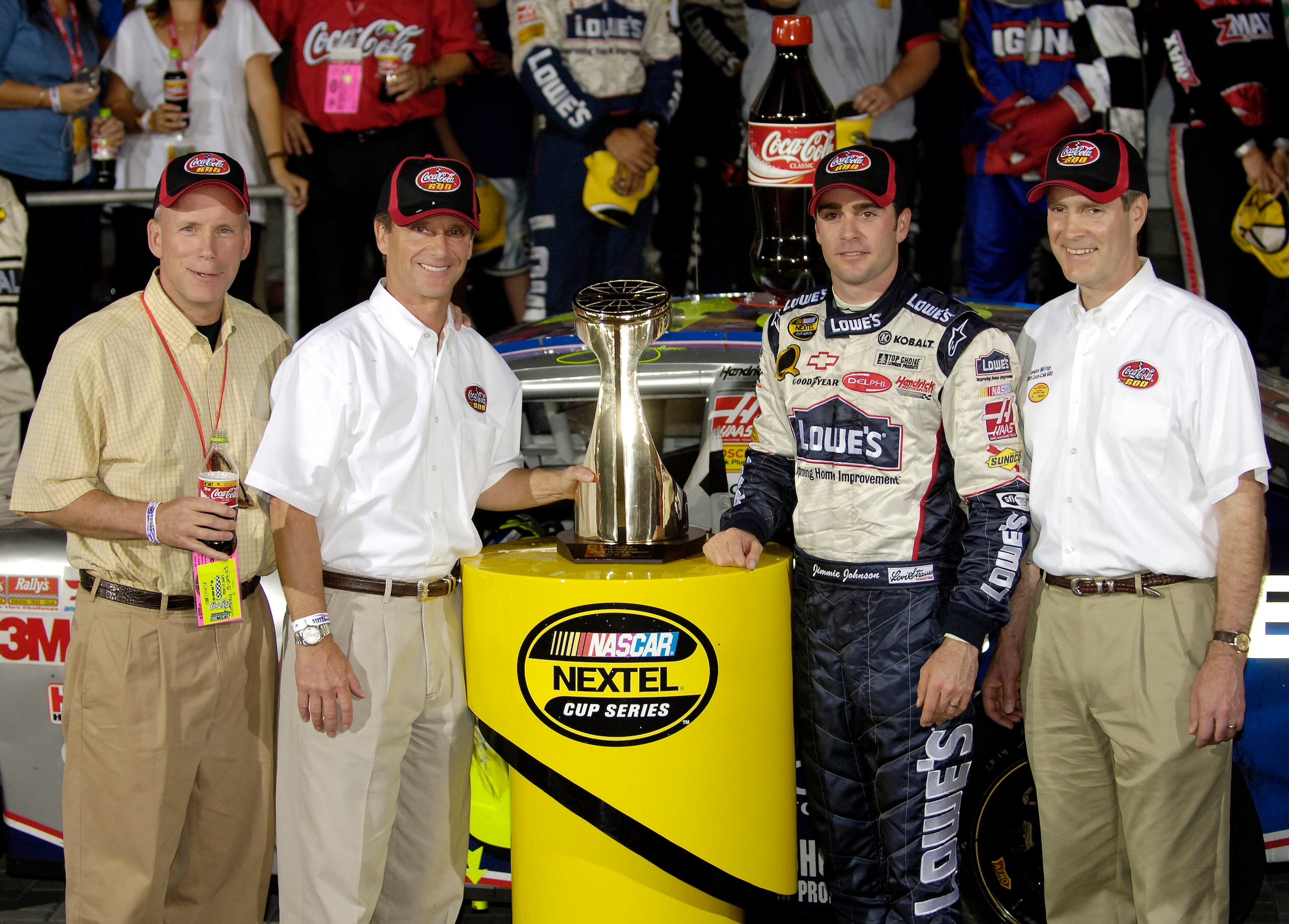 CONCORD, NC - MAY 29:  Jimmie Johnson, driver of the #48 Lowe's Chevrolet, poses with Senator Bill Frist (R-TN) (R) in Victory Lane after winning the NASCAR Nextel Cup Series Coca-Cola 600 on May 29, 2005 at the Lowe's Motor Speedway in Concord, North Car