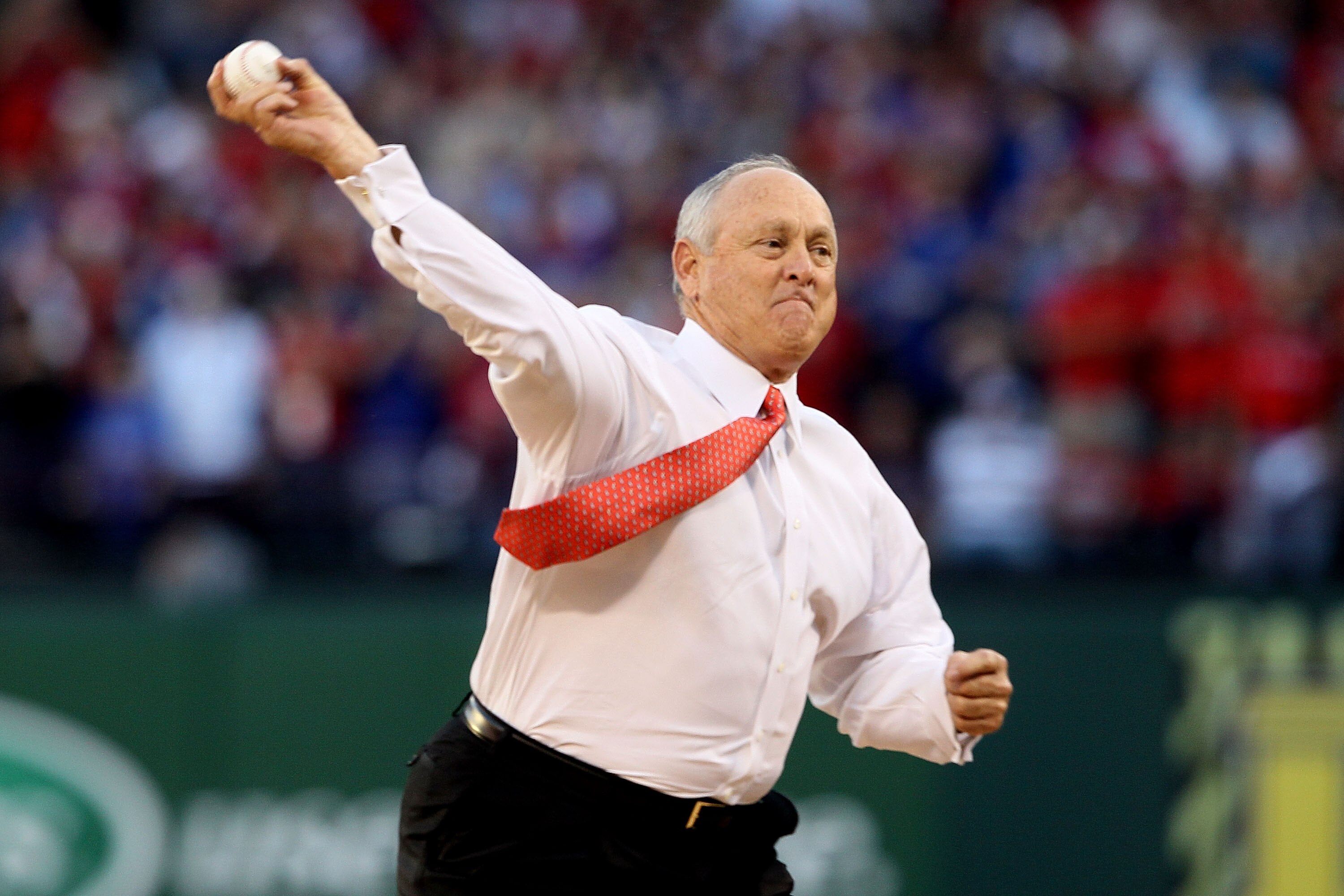 ARLINGTON, TX - OCTOBER 30:  Team President Nolan Ryan of the Texas Rangers throws out the ceremonial first pitch against the San Francisco Giants in Game Three of the 2010 MLB World Series at Rangers Ballpark in Arlington on October 30, 2010 in Arlington
