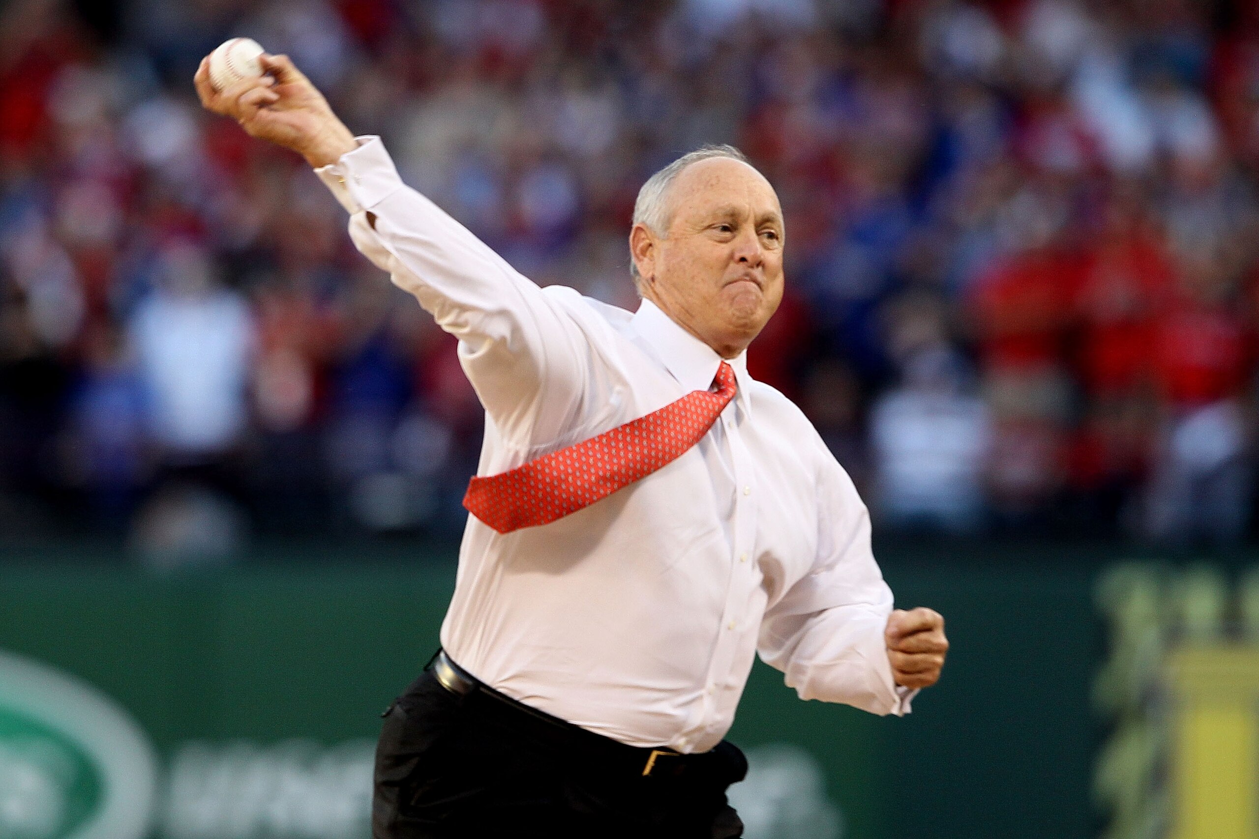 ARLINGTON, TX - OCTOBER 30:  Team President Nolan Ryan of the Texas Rangers throws out the ceremonial first pitch against the San Francisco Giants in Game Three of the 2010 MLB World Series at Rangers Ballpark in Arlington on October 30, 2010 in Arlington