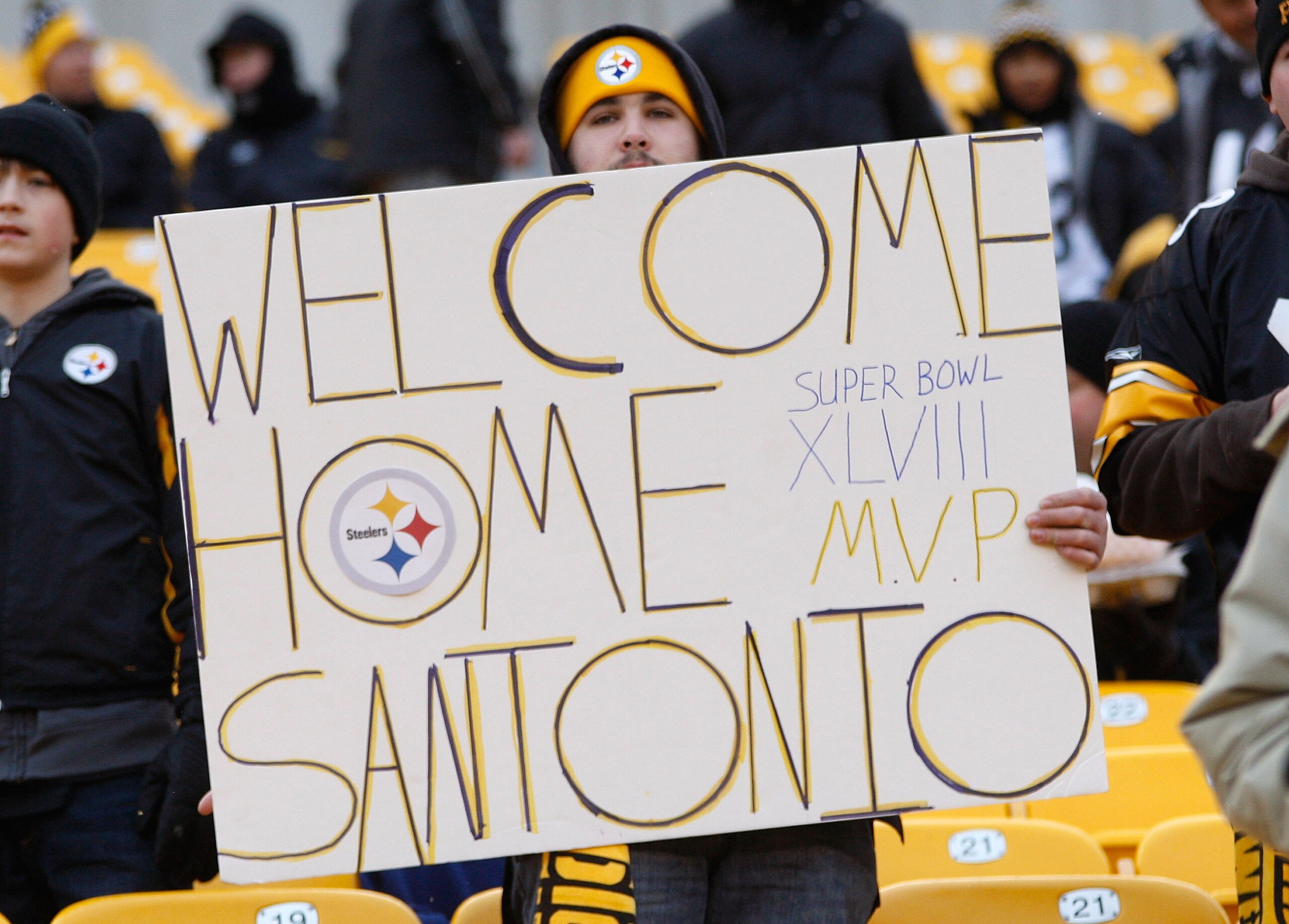 PITTSBURGH - DECEMBER 19: A Pittsburgh Steelers fan holds up a sign welcoming back Santonio Holmes #10 of the New York Jets who was traded from the Pittsburgh Steelers during the offseason before the game on December 19, 2010 at Heinz Field in Pittsburgh PITTSBURGH - DECEMBER 19: A Pittsburgh Steelers fan holds up a sign welcoming back Santonio Holmes #10 of the New York Jets who was traded from the Pittsburgh Steelers during the offseason before the game on December 19, 2010 at Heinz Field in Pittsburgh
