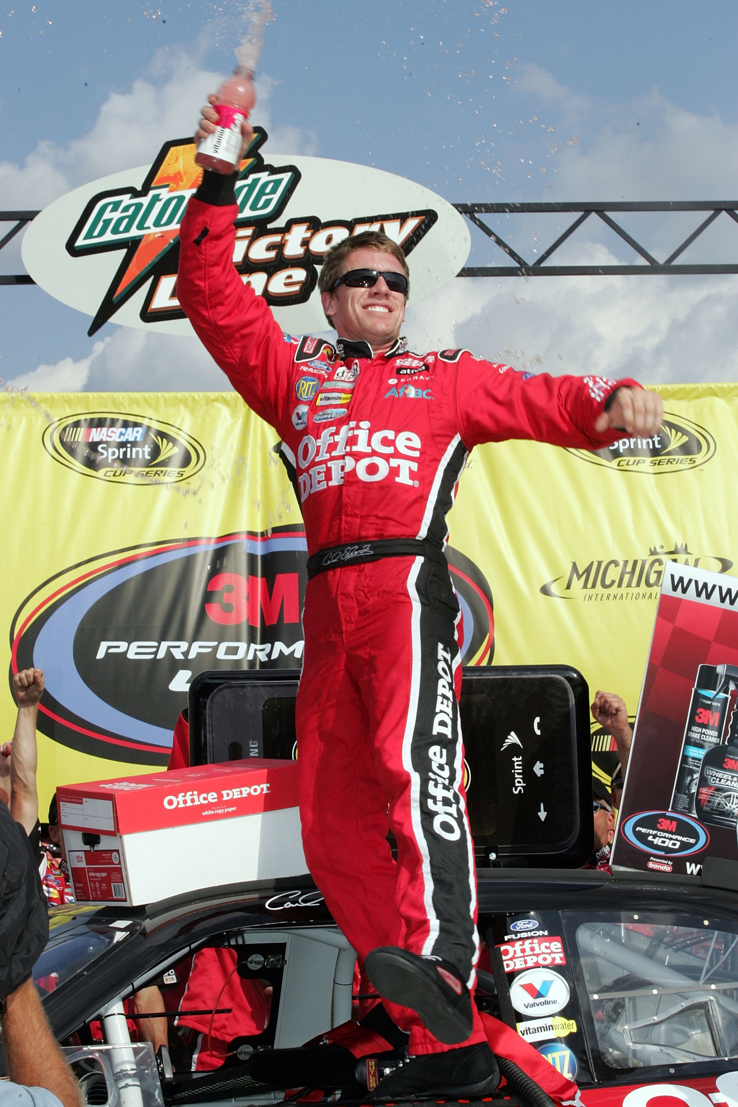 BROOKLYN, MI - AUGUST 17:  Carl Edwards, driver of the #99 Office Depot Ford, celebrates in victory lane after winning the NASCAR Sprint Cup Series 3M Performance 400 at Michigan International Speedway on August 17, 2008 in Brooklyn, Michigan.  (Photo by
