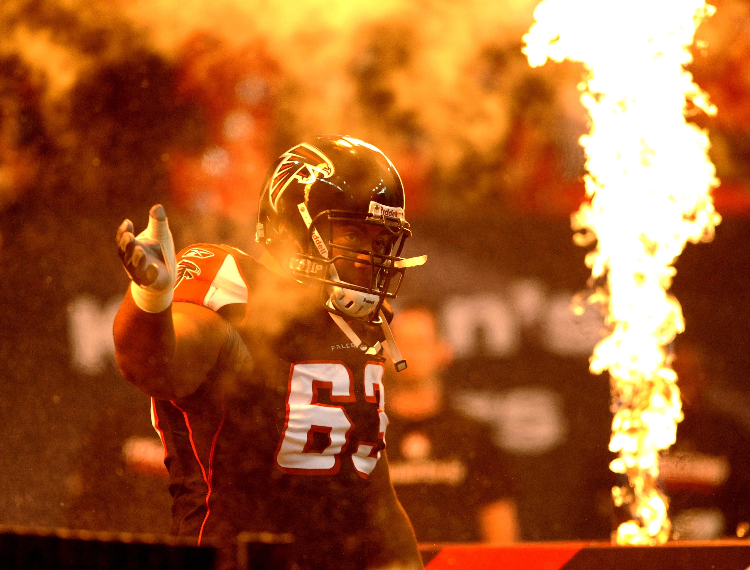ATLANTA - NOVEMBER 23: Guard Justin Blalock #63 of the Atlanta Falcons enters the field before play against the Carolina Panthers at the Georgia Dome on November 23, 2008 in Atlanta, Georgia.  (Photo by Al Messerschmidt/Getty Images)