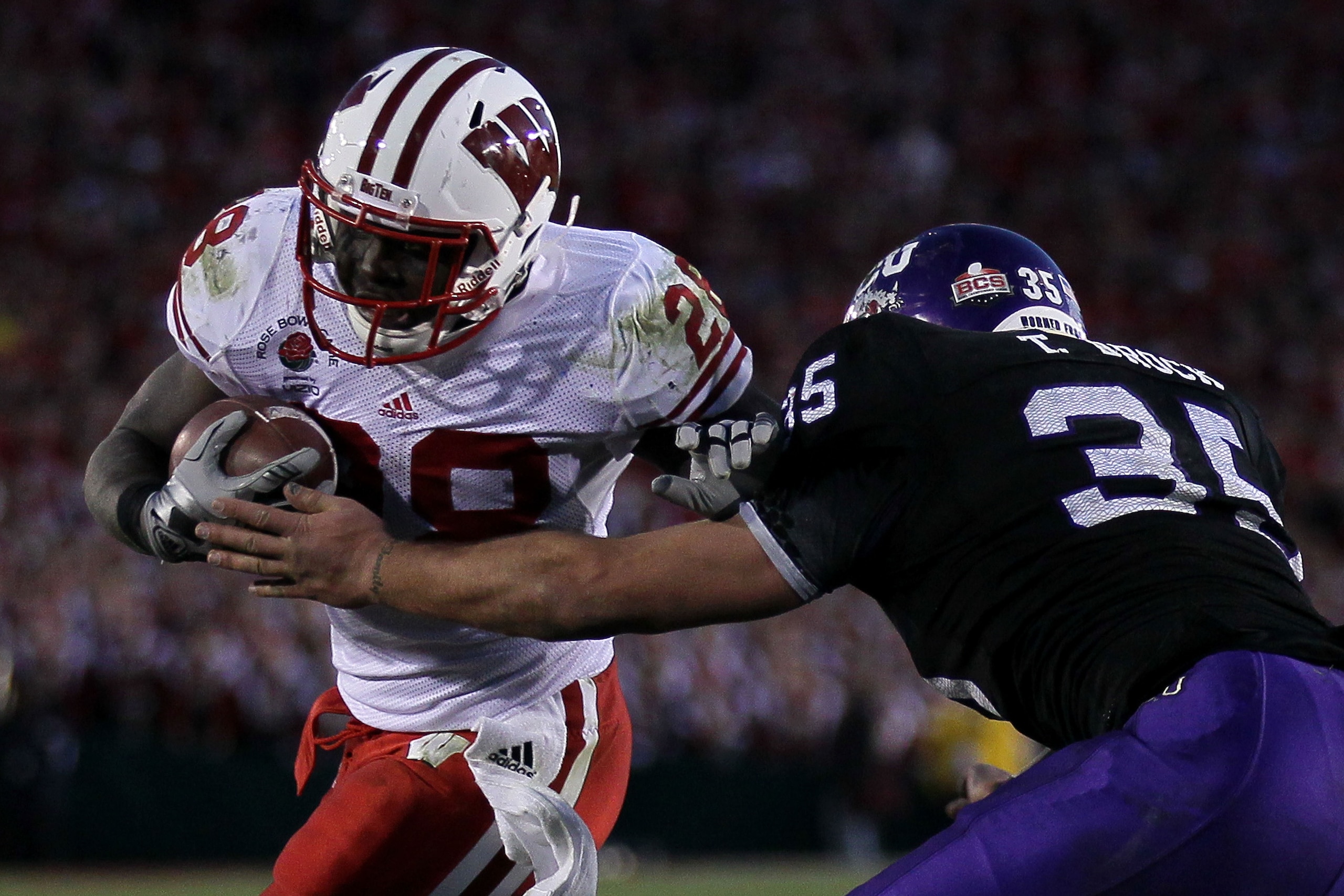 PASADENA, CA - JANUARY 01: Running back Montee Ball #28 of the Wisconsin Badgers rushes with the ball against the TCU Horned Frogs during the 97th Rose Bowl game on January 1, 2011 in Pasadena, California. (Photo by Stephen Dunn/Getty Images) PASADENA, CA - JANUARY 01: Running back Montee Ball #28 of the Wisconsin Badgers rushes with the ball against the TCU Horned Frogs during the 97th Rose Bowl game on January 1, 2011 in Pasadena, California. (Photo by Stephen Dunn/Getty Images)