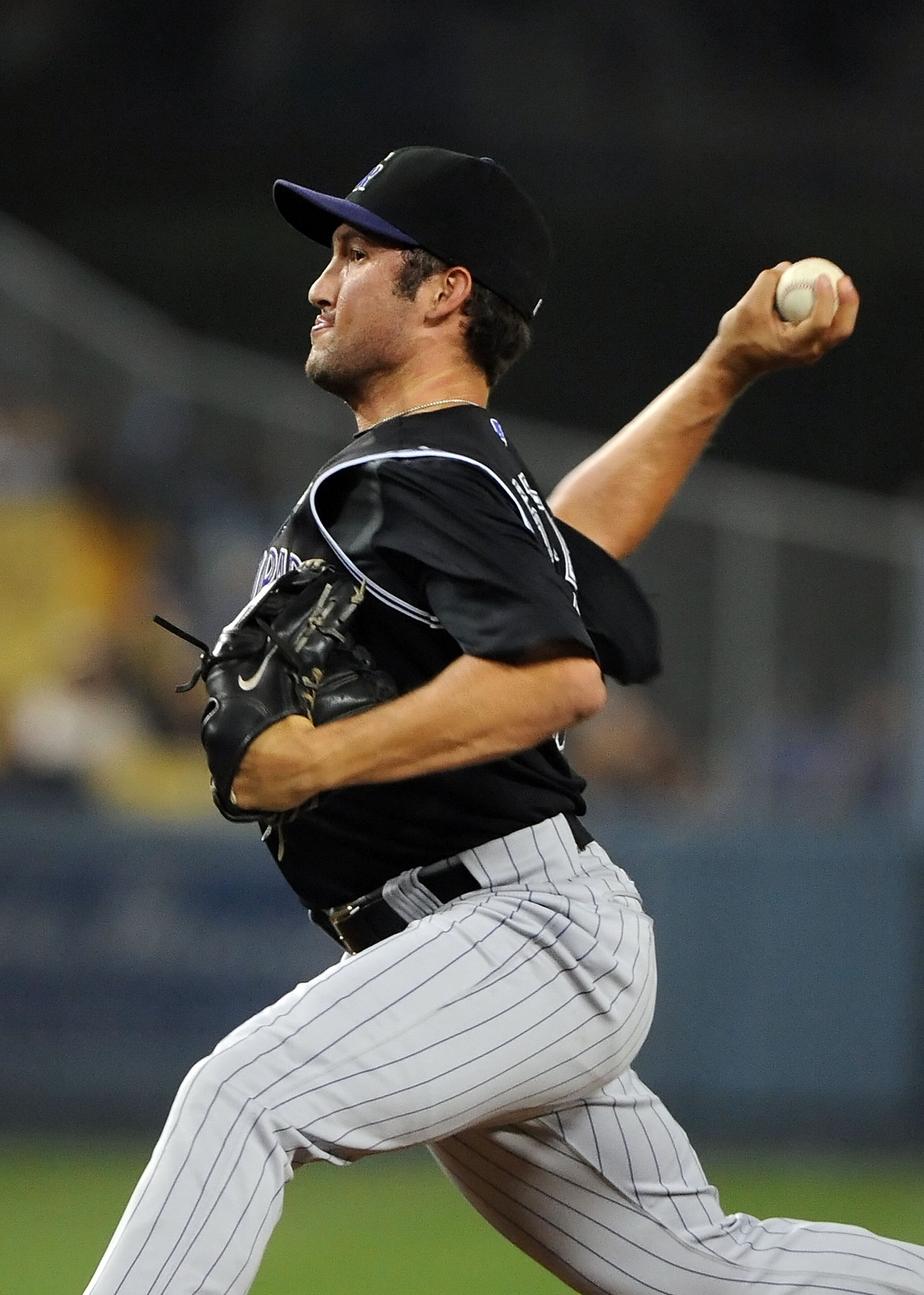 LOS ANGELES, CA - SEPTEMBER 17:  Huston Street #16 of the Colorado Rockies pitches against the Los Angeles Dodgers at Dodger Stadium on September 17, 2010 in Los Angeles, California.  (Photo by Lisa Blumenfeld/Getty Images)