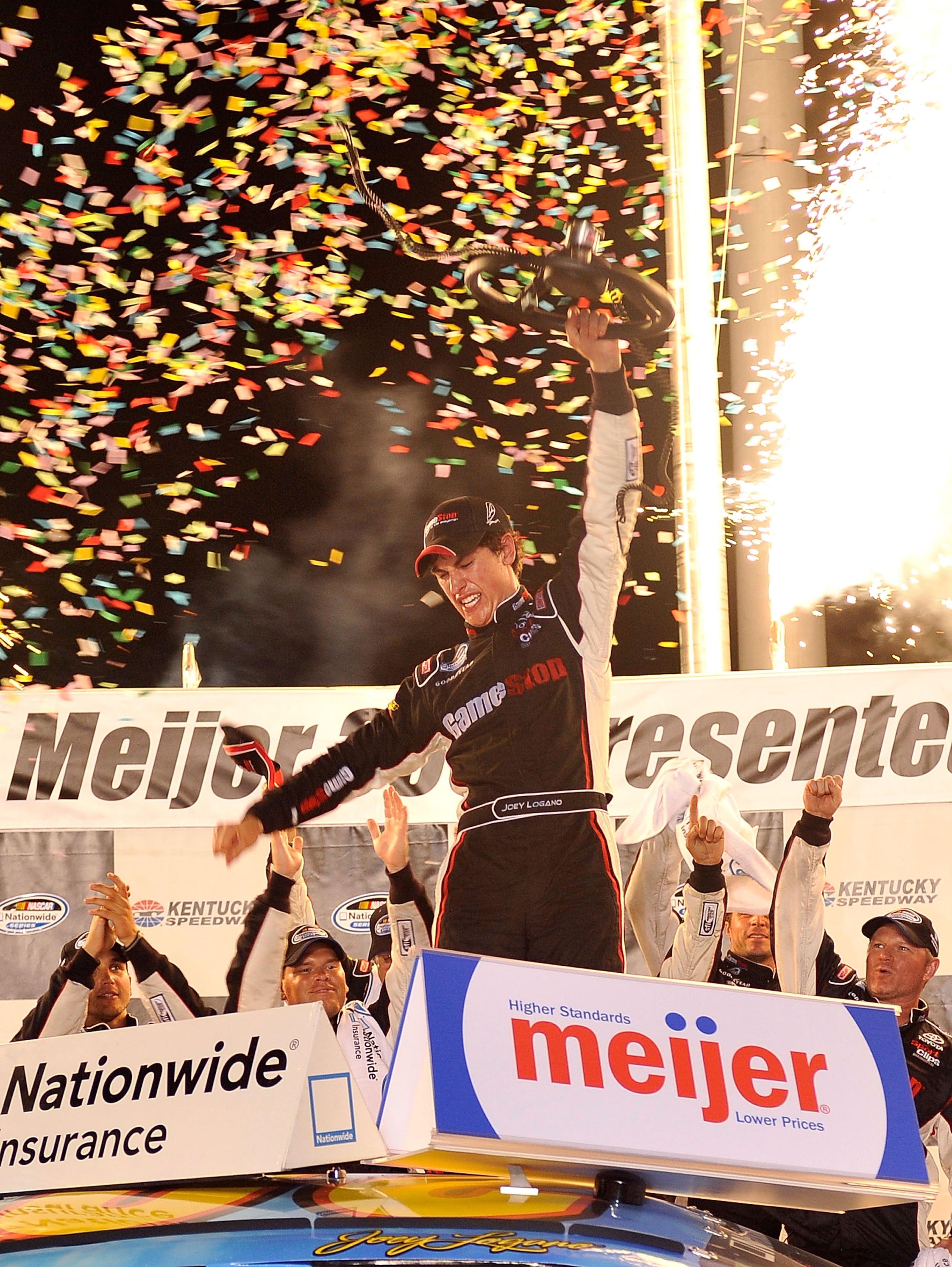 SPARTA, KY - JUNE 12:  Joey Logano, driver of the #20 GameStop Toyota, celebrates in Victory Lane after winning the NASCAR Nationwide Series Meijer 300 presented by Ritz at Kentucky Speedway on June 12, 2010 in Sparta, Kentucky.  (Photo by Grant Halverson