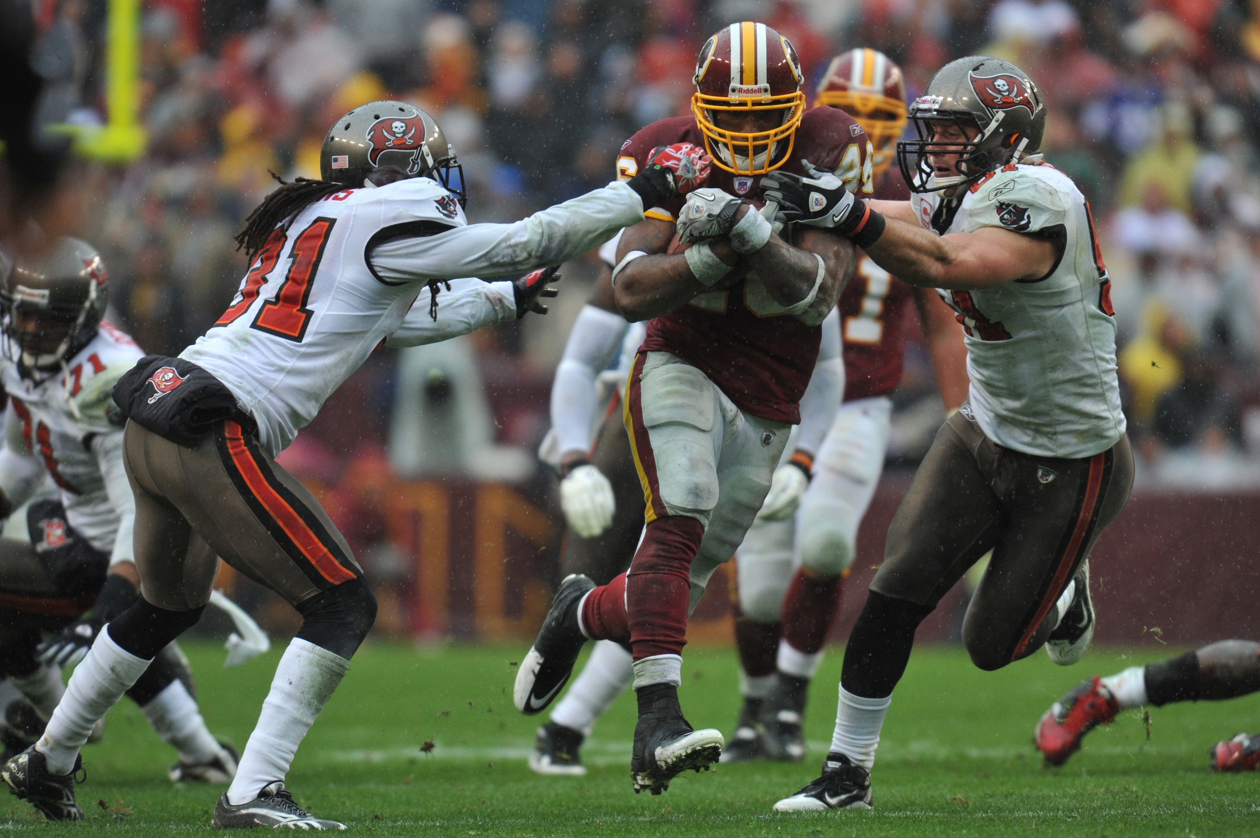 LANDOVER, MD - DECEMBER 12:  Ryan Torain #46 of the Washington Redskins runs the ball against the Tampa Bay Buccaneers  at FedExField on December 12, 2010 in Landover, Maryland. The Buccaneers defeated the Redskins 17-16. (Photo by Larry French/Getty Imag