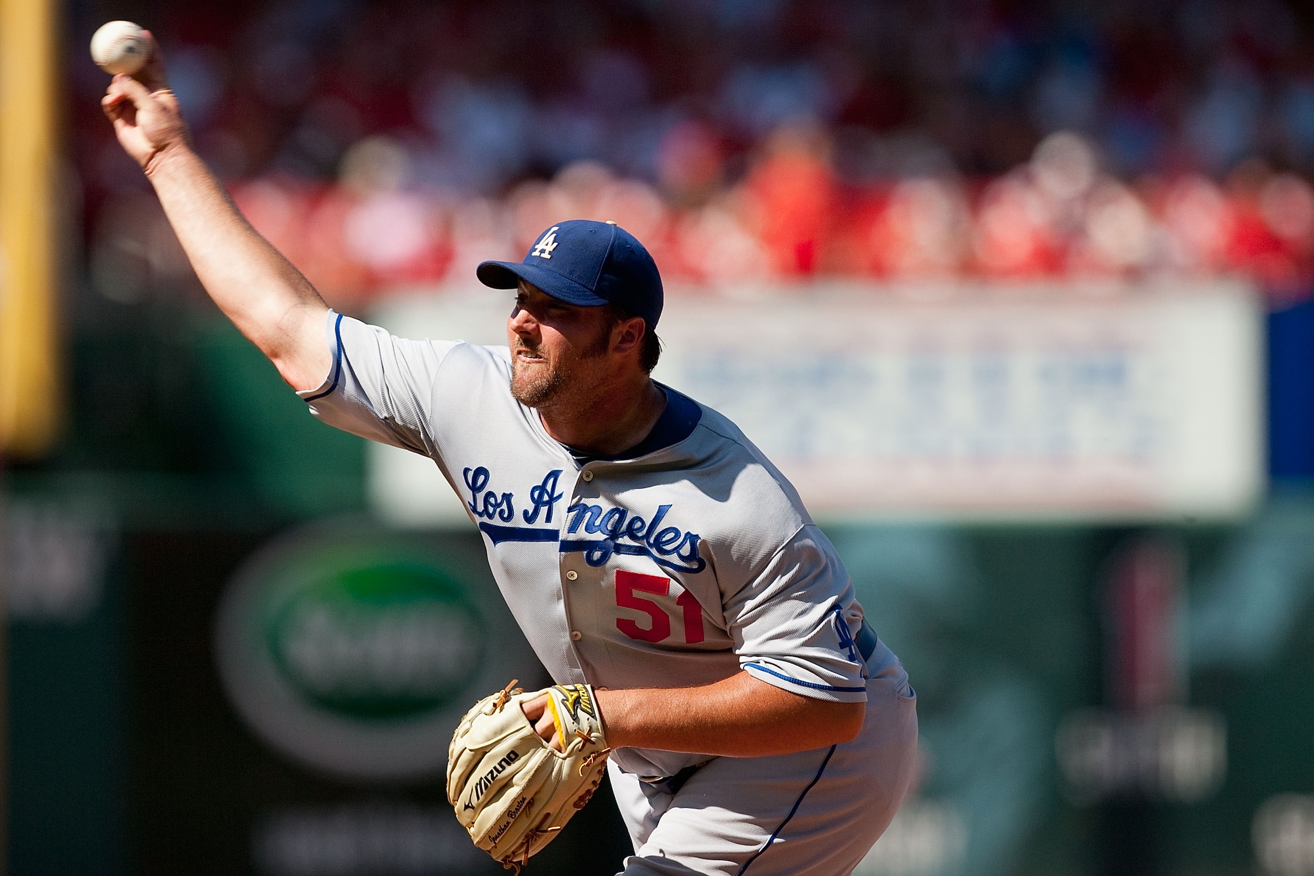 ST. LOUIS - JULY 18: Relief pitcher Jonathan Broxton #51 of the Los Angeles Dodgers throws against the St. Louis Cardinals at Busch Stadium on July 18, 2010 in St. Louis, Missouri.  The Cardinals beat the Dodgers 5-4.  (Photo by Dilip Vishwanat/Getty Imag