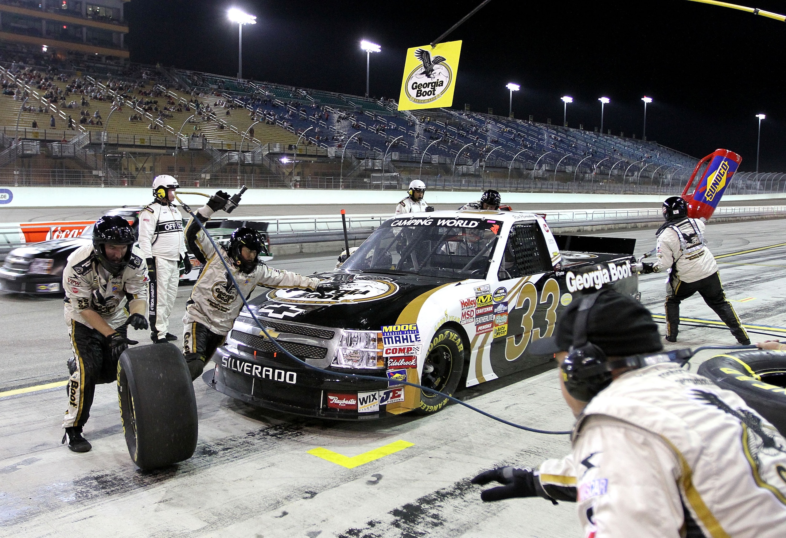 HOMESTEAD, FL - NOVEMBER 19:  Ron Hornaday Jr., driver of the #33 Georgia Boot Chevrolet, makes a pit stop during the NASCAR Camping World Truck Series Ford 200 at Homestead-Miami Speedway on November 19, 2010 in Homestead, Florida.  (Photo by Jerry Markl