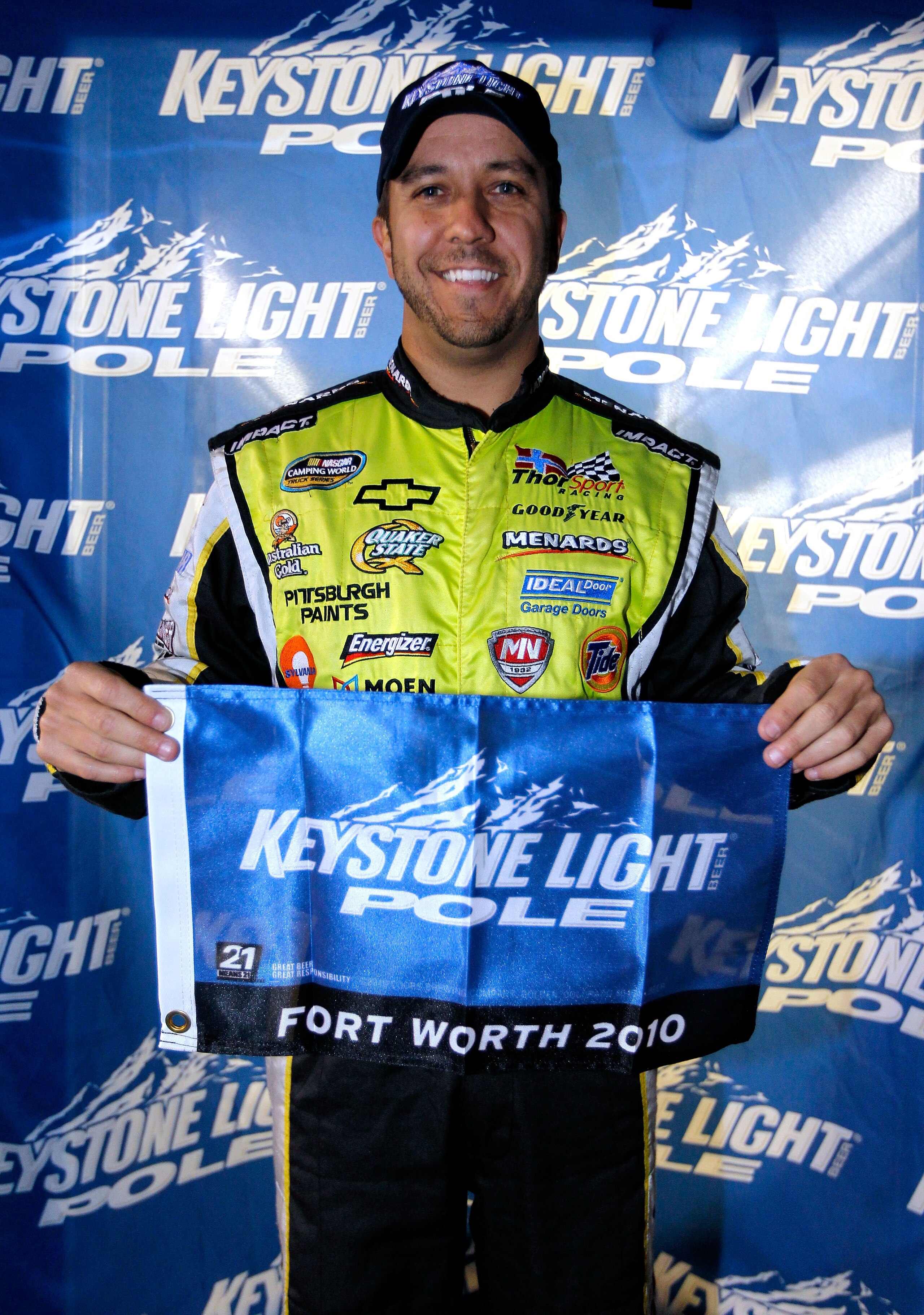 FORT WORTH, TX - NOVEMBER 04:  Matt Crafton, driver of the #88 McGuire-Nicholas/Menards Chevrolet, poses in after qualifying for the pole position in the NASCAR Camping World Truck Series WinStar World Casino 350k at Texas Motor Speedway on November 4, 20