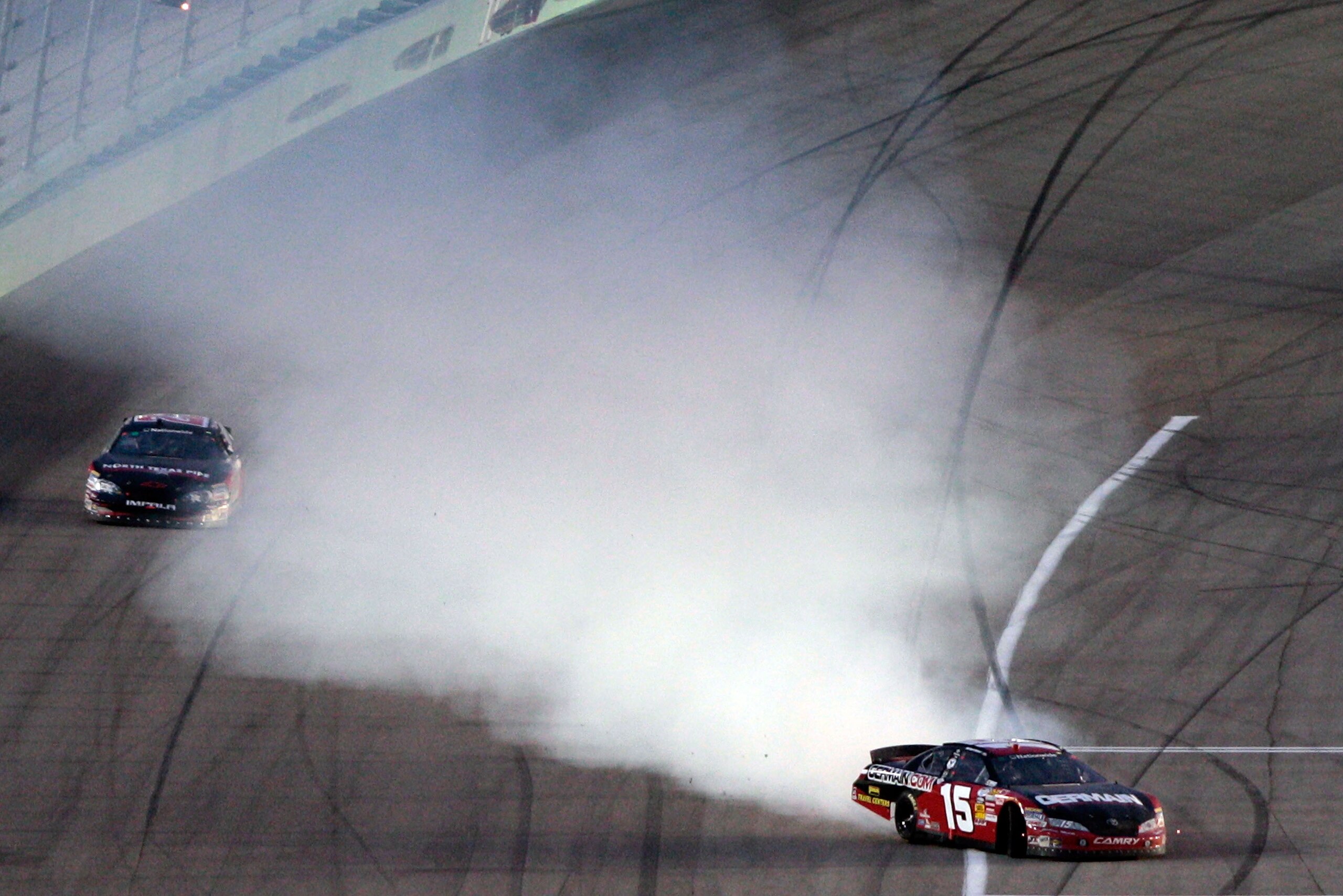 HOMESTEAD, FL - NOVEMBER 20:  Michael Annett, driver of the #15  Germain.com Toyota, loses control of his car during the NASCAR Nationwide Series Ford 300 at Homestead-Miami Speedway on November 20, 2010 in Homestead, Florida.  (Photo by Chris Graythen/Ge