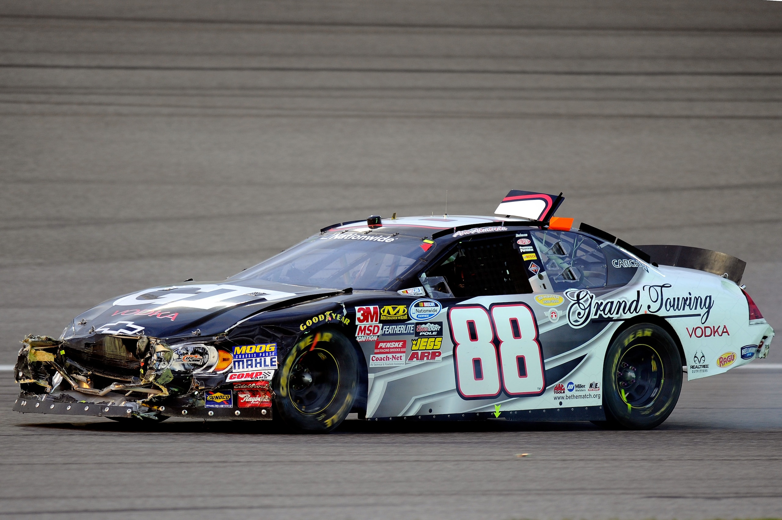 HOMESTEAD, FL - NOVEMBER 20:  Aric Almirola, driver of the #88 GT Vodka Chevrolet, drives after crashing during the NASCAR Nationwide Series Ford 300 at Homestead-Miami Speedway on November 20, 2010 in Homestead, Florida.  (Photo by John Harrelson/Getty I