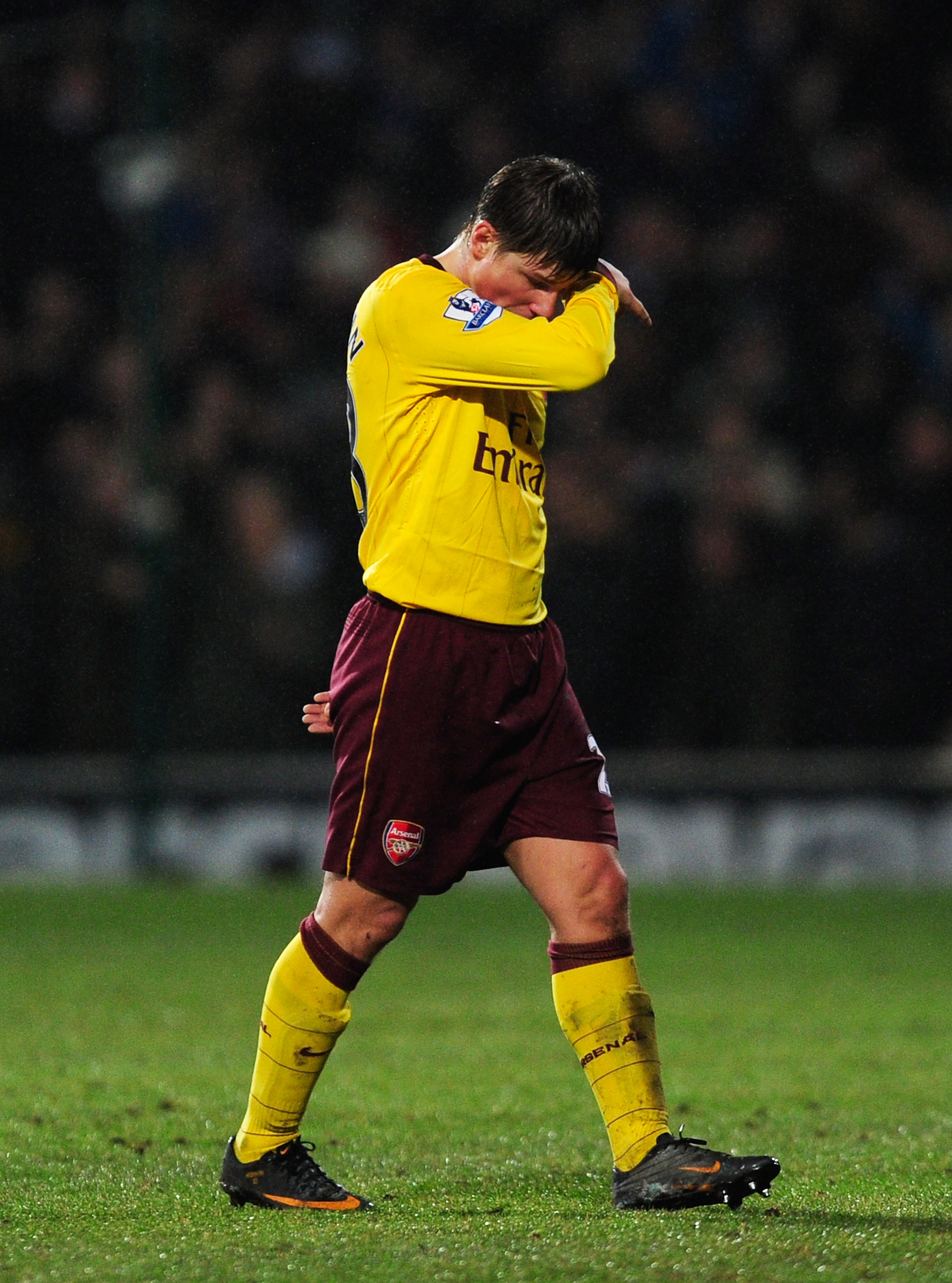 IPSWICH, ENGLAND - JANUARY 12: Andrey Arshavin of Arsenal looks dejected after seeing Tamas Priskin of Ipswich Town open the scoring during the Carling Cup Semi Final First Leg match between Ipswich Town and Arsenal at Portman Road on January 12, 2011 in 