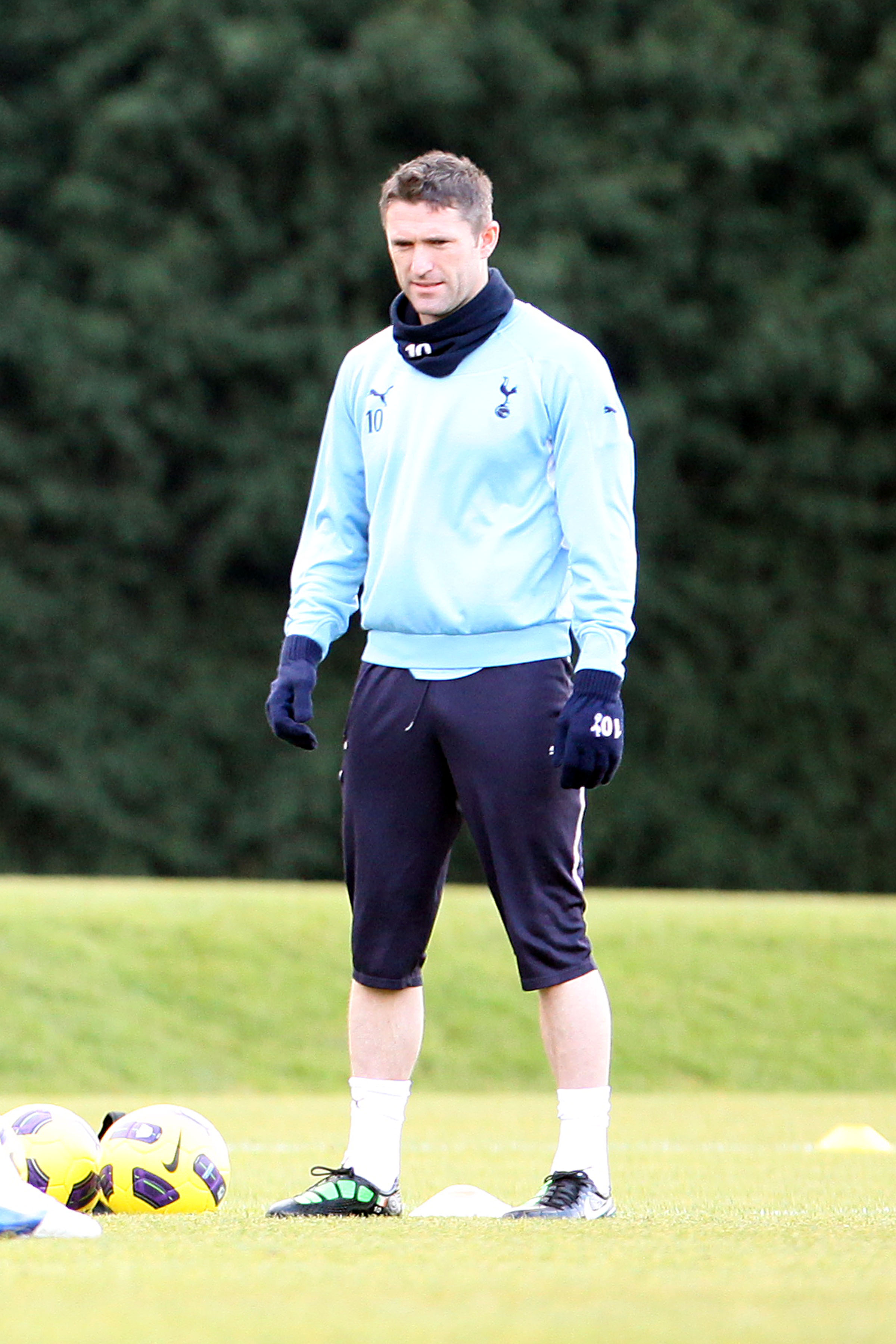 CHIGWELL, UNITED KINGDOM - JANUARY 11: Robbie Keane takes part in a Spurs training session on January 11, 2011 in Chigwell, England. (Photo by Neil Mockford/Getty Images)