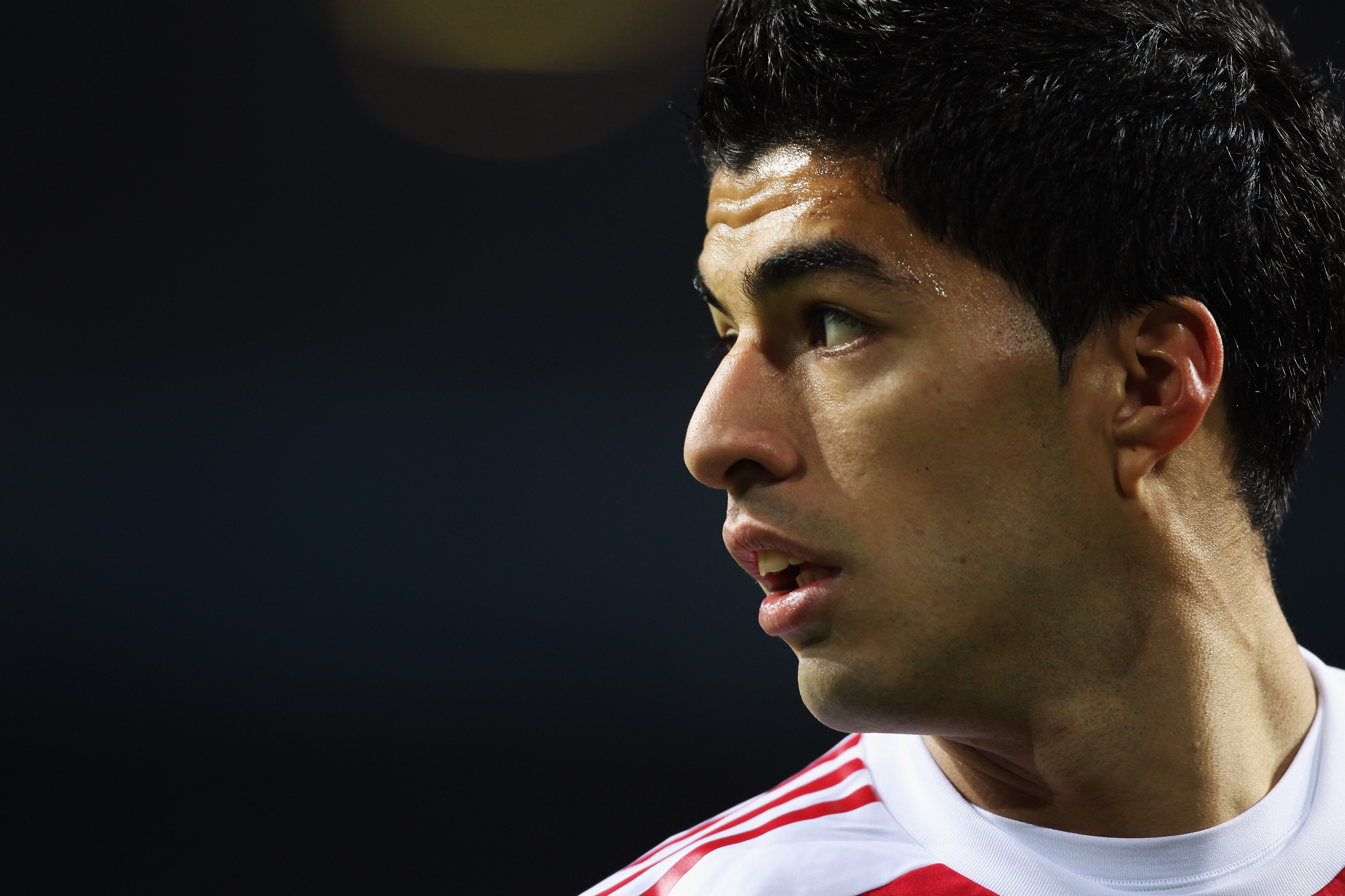 AMSTERDAM, NETHERLANDS - OCTOBER 19:  Luis Suarez of AFC Ajax looks on during the UEFA Champions League Group G match between AFC Ajax and AJ Auxerre at the Amsterdam ArenA on October 19, 2010 in Amsterdam, Netherlands.  (Photo by Bryn Lennon/Getty Images