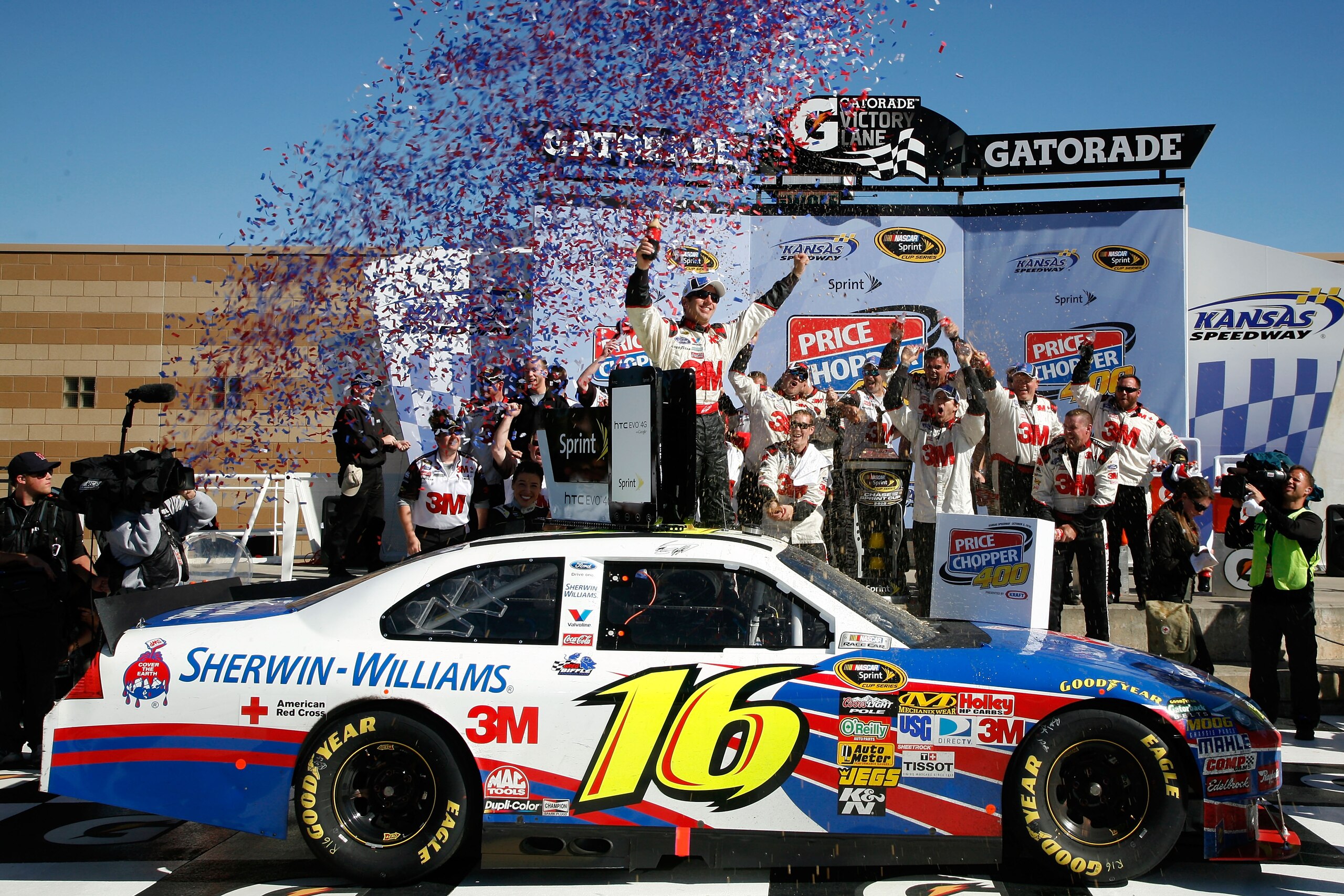 KANSAS CITY, KS - OCTOBER 03:  Greg Biffle, driver of the #16 3M Ford, celebrates in victory lane after winning the NASCAR Sprint Cup Series Price Chopper 400 on October 3, 2010 in Kansas City, Kansas.  (Photo by Jerry Markland/Getty Images for NASCAR)
