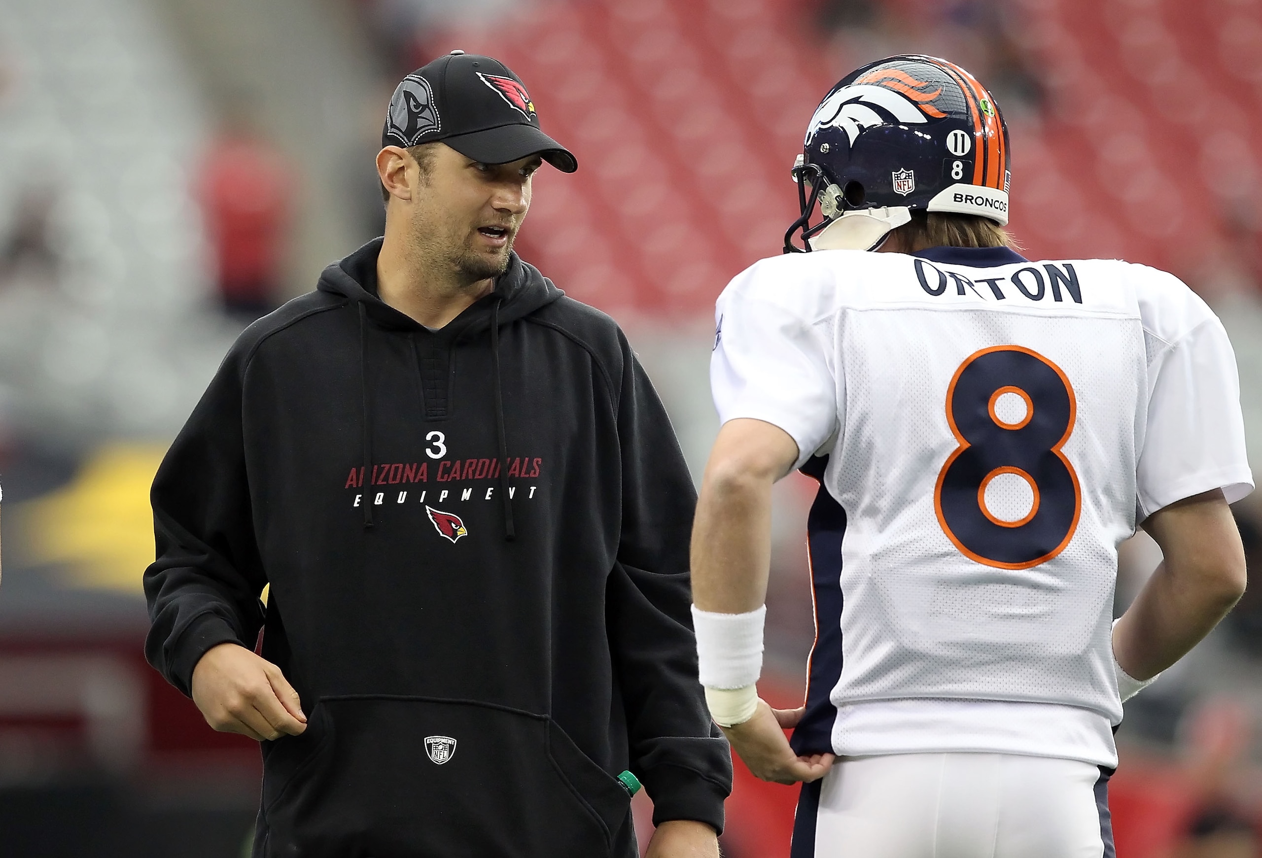GLENDALE, AZ - DECEMBER 12:  Quarterbacks Derek Anderson #3 of the Arizona Cardinals talks with Kyle Orton #8 of the Denver Broncos before the NFL game at the University of Phoenix Stadium on December 12, 2010 in Glendale, Arizona. The Cardinals defeated