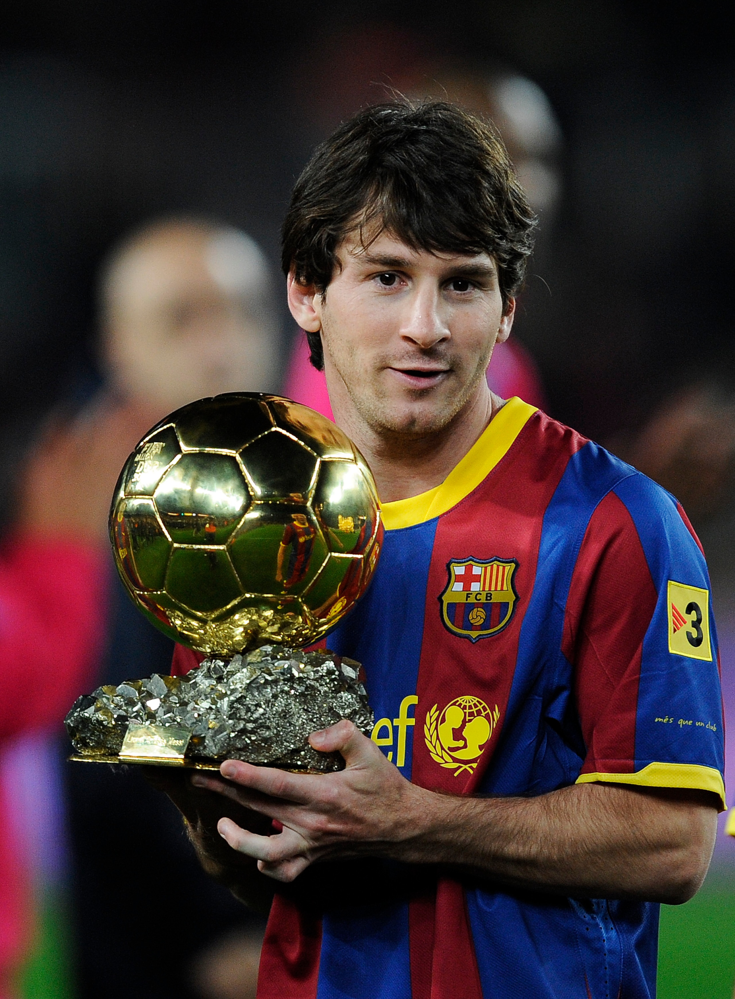 BARCELONA, SPAIN - JANUARY 12:  Lionel Messi of FC Barcelona holds the Ballon d'Or trophy prior the Copa del Rey quarter final first leg match FC Barcelona and Betis at Camp Nou on January 12, 2011 in Barcelona, Spain.  (Photo by David Ramos/Getty Images)