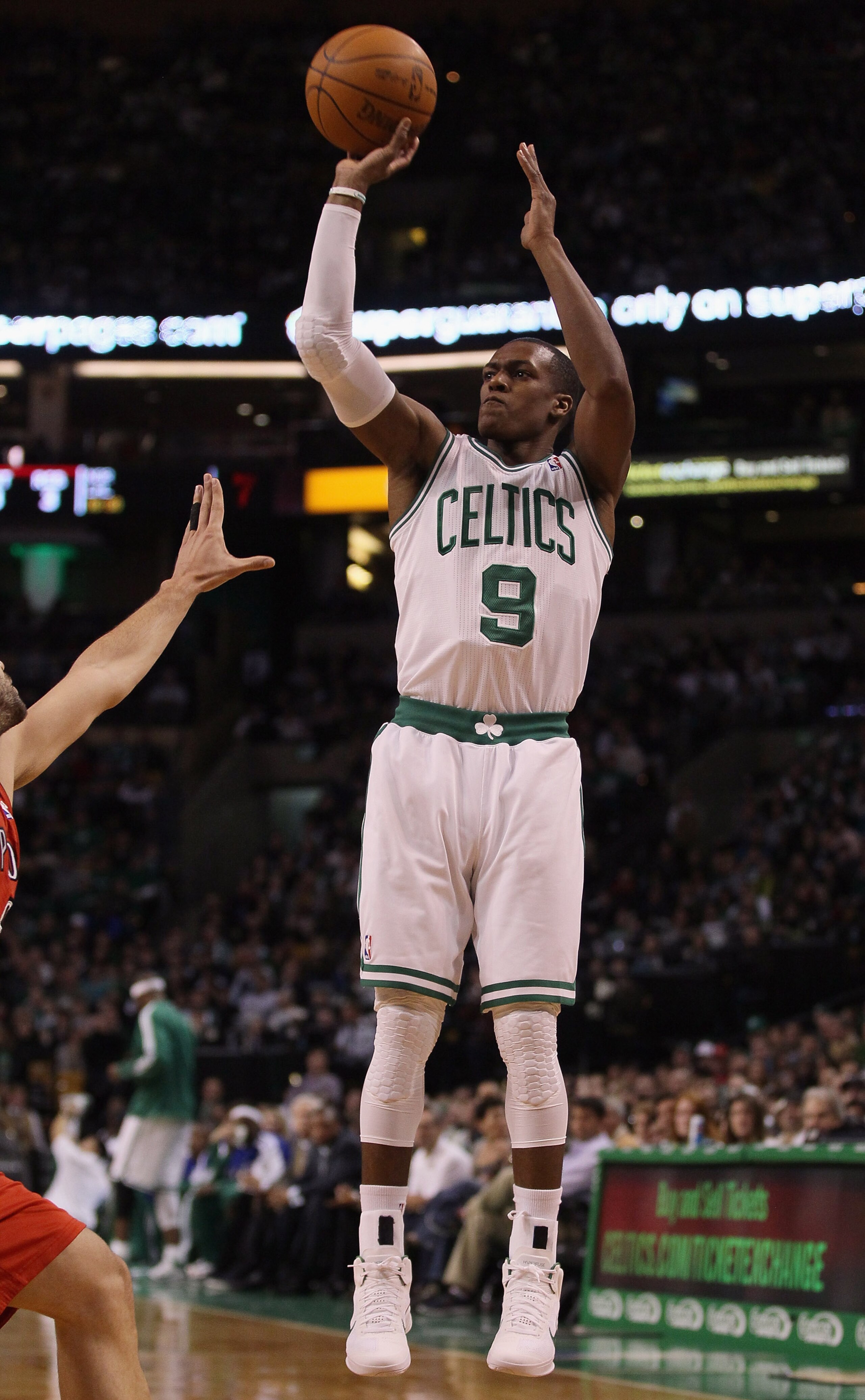 BOSTON, MA - JANUARY 07:  Rajon Rondo #9 of the Boston Celtics takes a shot in the first half against the Toronto Raptors on January 7, 2011 at the TD Garden in Boston, Massachusetts. NOTE TO USER: User expressly acknowledges and agrees that, by downloadi