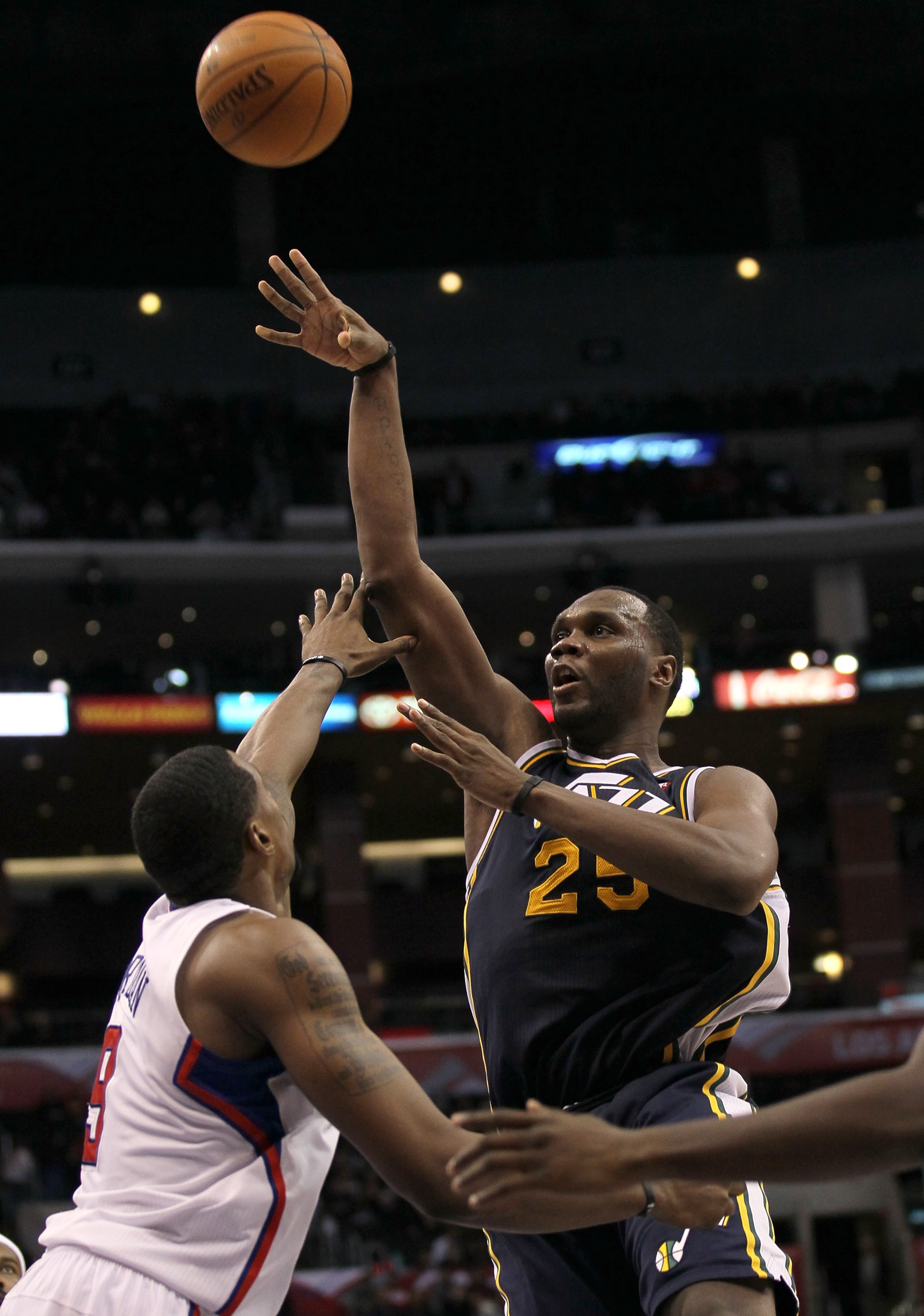 LOS ANGELES, CA - DECEMBER 29:  Al Jefferson #25 of the Utah Jazz shoots over DeAndre Jordan #9 of the Los Angeles Clippers at Staples Center on December 29, 2010 in Los Angeles, California.   The Jazz won 103-85.  NOTE TO USER: User expressly acknowledge
