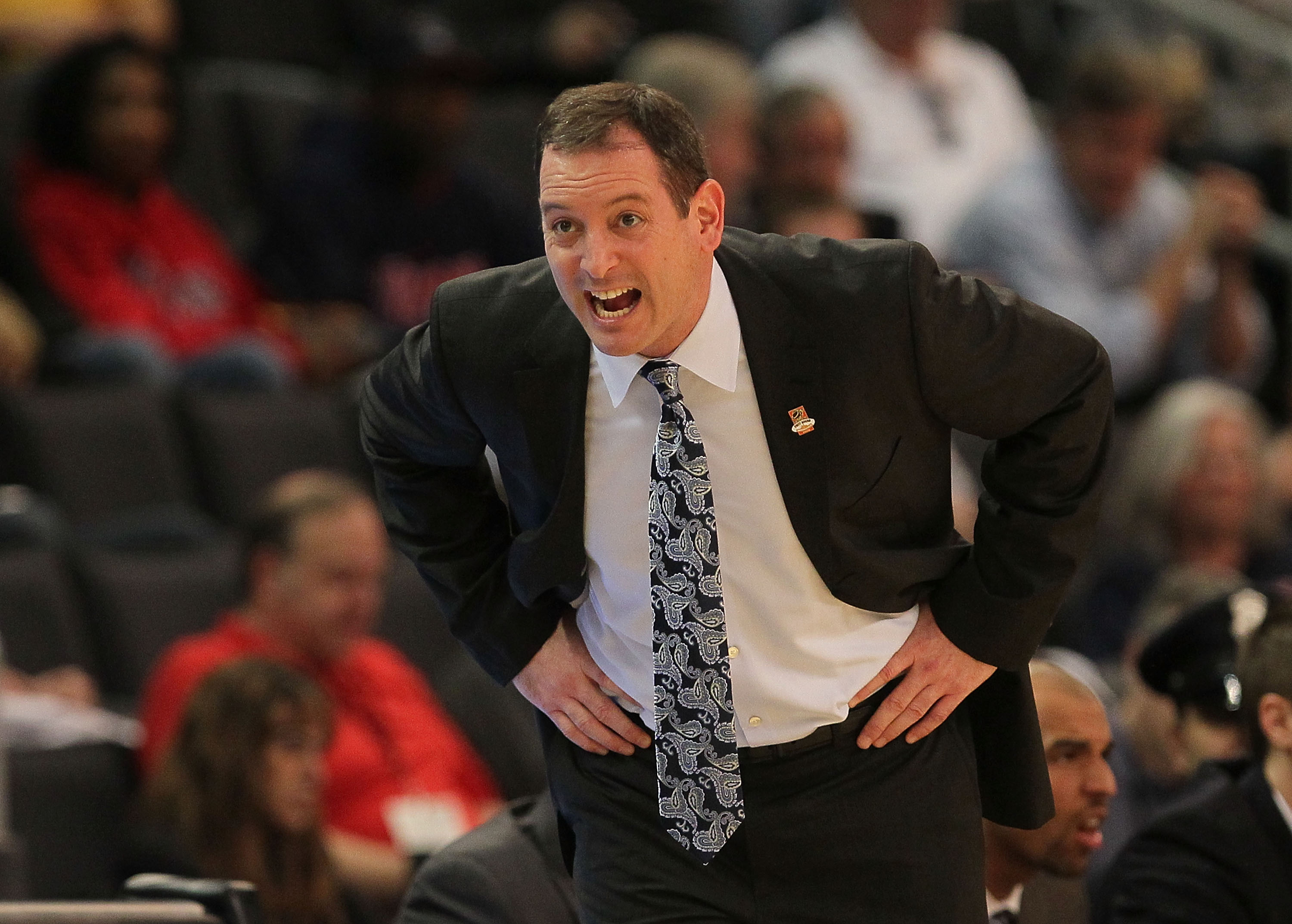 PROVIDENCE, RI - MARCH 18:  Coach Mike Rice of the Robert Morris Colonials reacts against the Villanova Wildcats during the first round of the NCAA men's basketball tournament at Dunkin' Donuts Center on March 18, 2010 in Providence, Rhode Island. (Photo