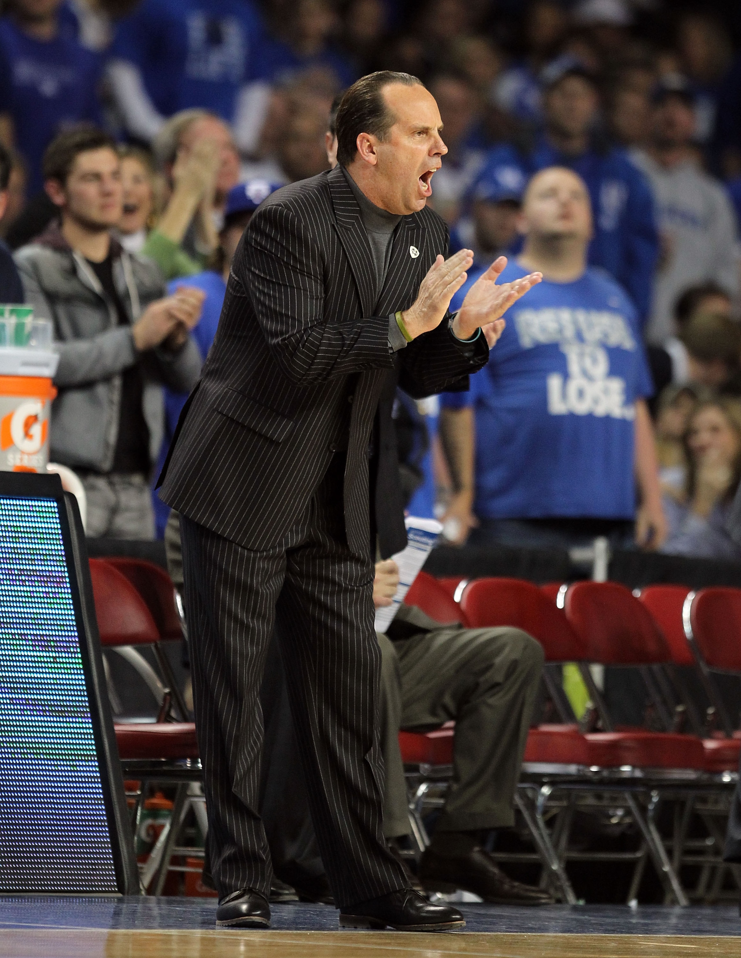 LOUISVILLE, KY - DECEMBER 08:  Mike Brey the Head Coach of the Notre Dame Fighting Irish gives instructions to his team during the game against the Kentucky Wildcats in the 2010 DIRECTV SEC/BIG EAST Invitational at Freedom Hall on December 8, 2010 in Loui