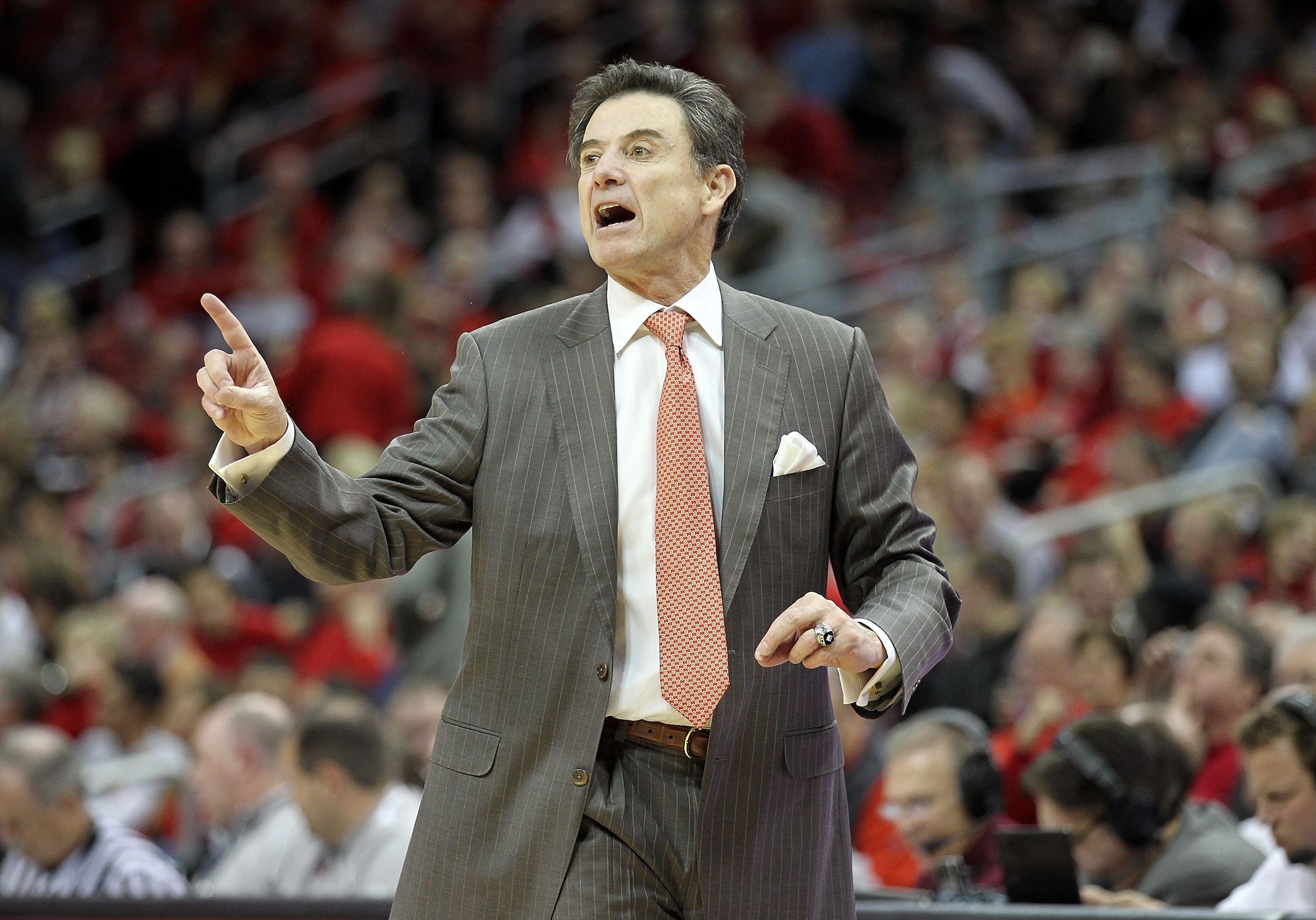 LOUISVILLE, KY - JANUARY 05:  Rick Pitino the Head Coach of the Louisville Cardinals gives instructions to his team during the Big East Conference game against the Seton Hall Pirates at the KFC Yum! Center on January 5, 2011 in Louisville, Kentucky.  (Pho
