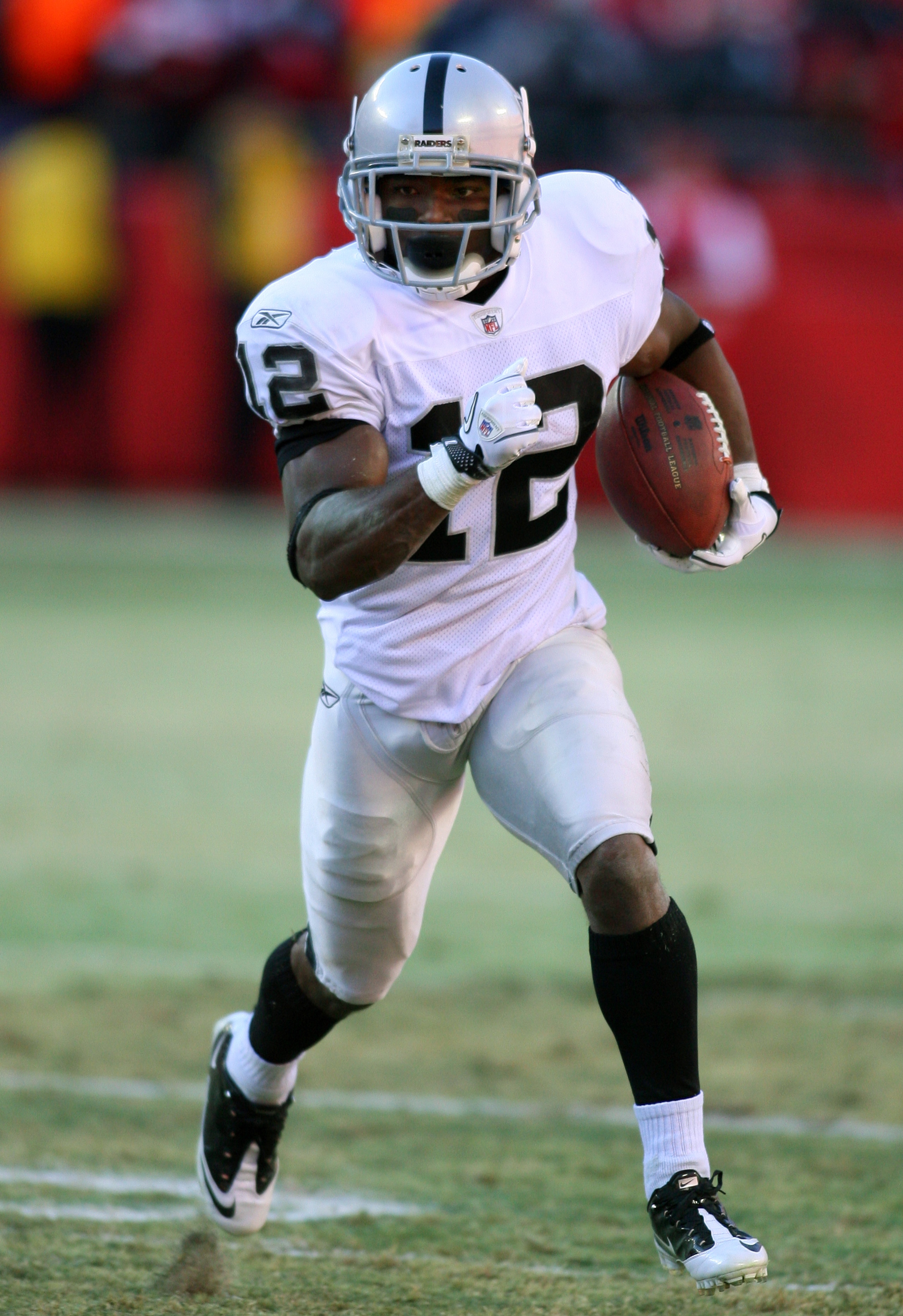 KANSAS CITY, MO - JANUARY 02:  Wide receiver Jacoby Ford #12 of the Oakland Raiders runs down field in a game against the Kansas City Chiefs at Arrowhead Stadium on January 2, 2011 in Kansas City, Missouri.  (Photo by Tim Umphrey/Getty Images)