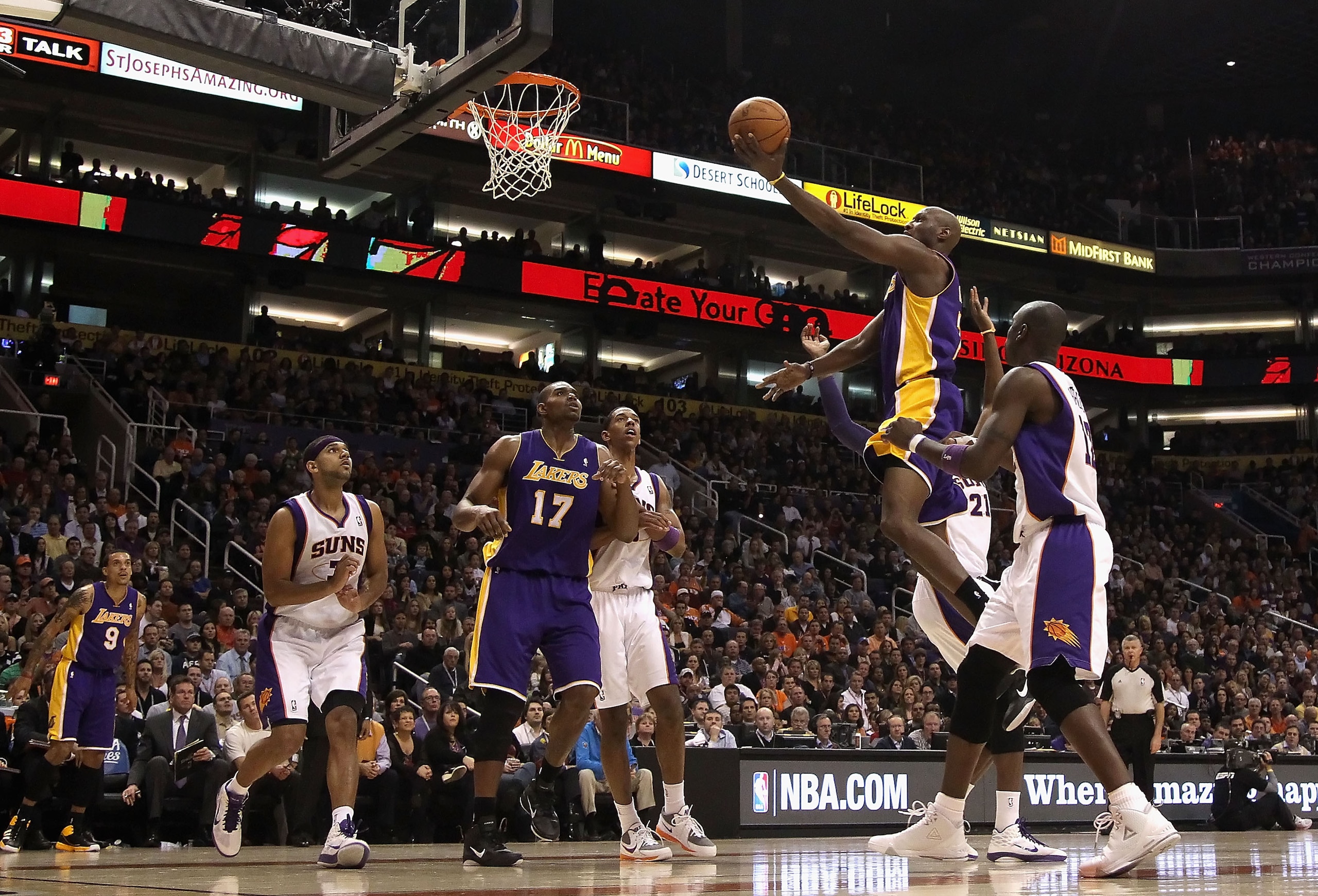 PHOENIX - JANUARY 05: Lamar Odom #7 of the Los Angeles Lakers lays up a shot against the Phoenix Suns during the NBA game at US Airways Center on January 5, 2011 in Phoenix, Arizona. The Lakers defeated the Suns 99-95. NOTE TO USER: User expressly acknowl