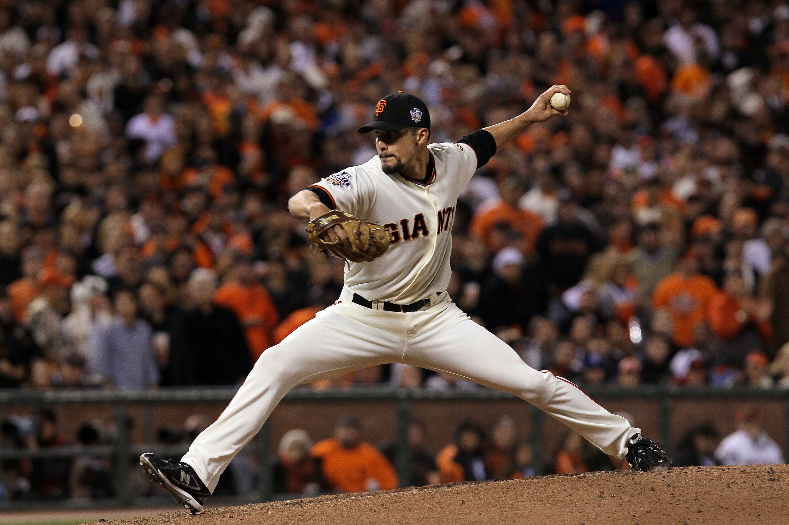 SAN FRANCISCO - OCTOBER 28:  Javier Lopez #49 of the San Francisco Giants pitches in the eighth inning while taking on the Texas Rangers in Game Two of the 2010 MLB World Series at AT&T Park on October 28, 2010 in San Francisco, California.  (Photo by Jus