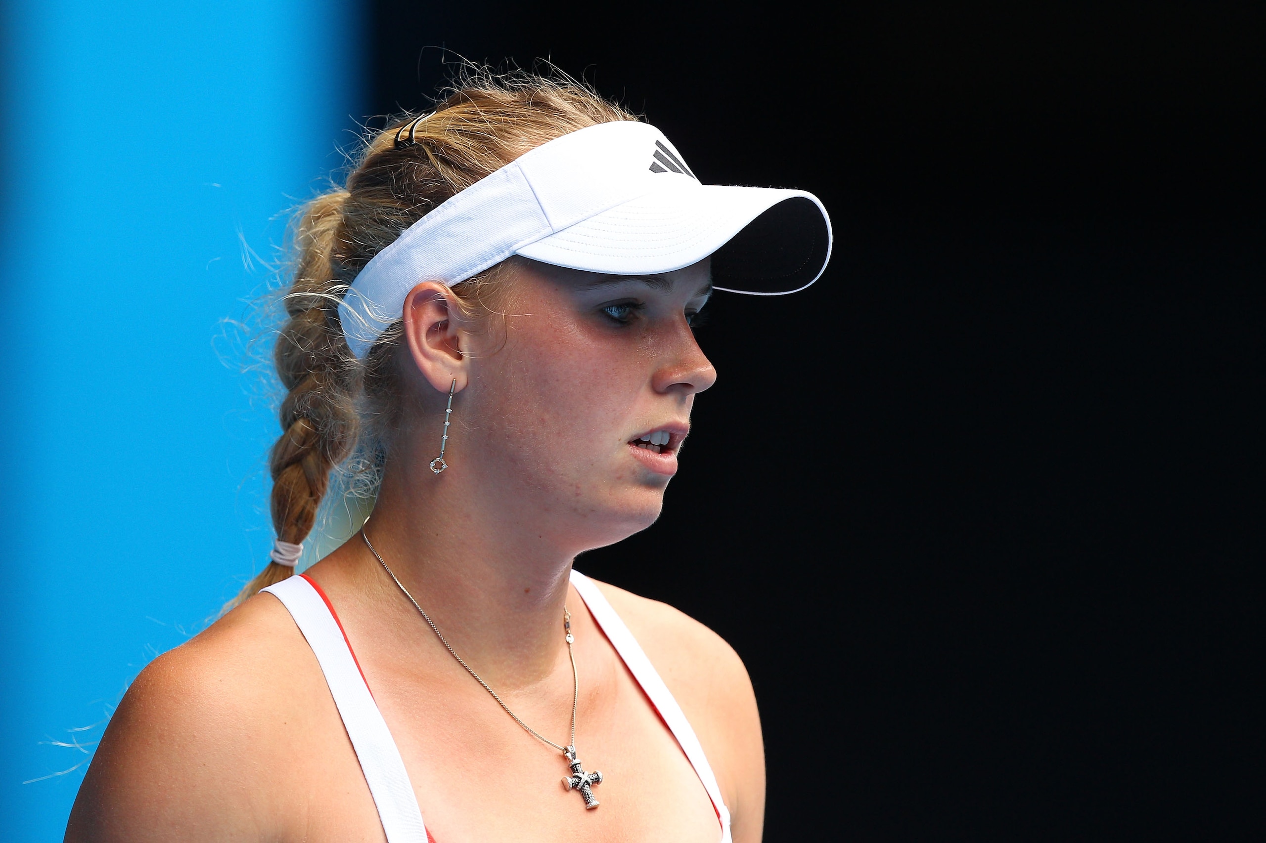 MELBOURNE, AUSTRALIA - JANUARY 17:  Caroline Wozniacki of Denmark reacts during her first round match against Gisela Dulko of Argentina during day one of the 2011 Australian Open at Melbourne Park on January 17, 2011 in Melbourne, Australia.  (Photo by Ca
