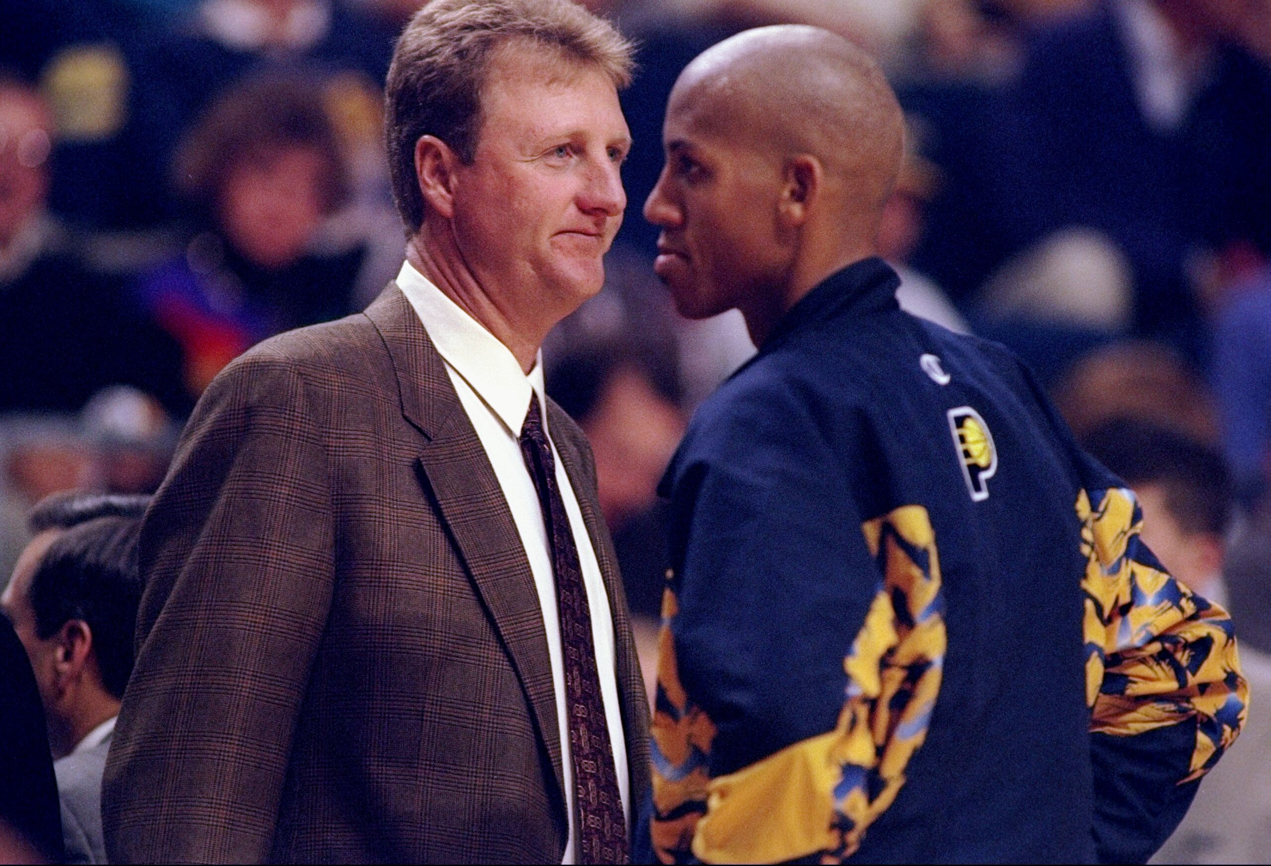 1 Oct 1997:  Head coach Larry Bird of the Indiana Pacers talks to guard Reggie Miller during a game against the Golden State Warriors at the Market Square Arena in Indianapolis, Indiana.  The Pacers won the game 96-83. Mandatory Credit: Mark Lyons  /Allsp