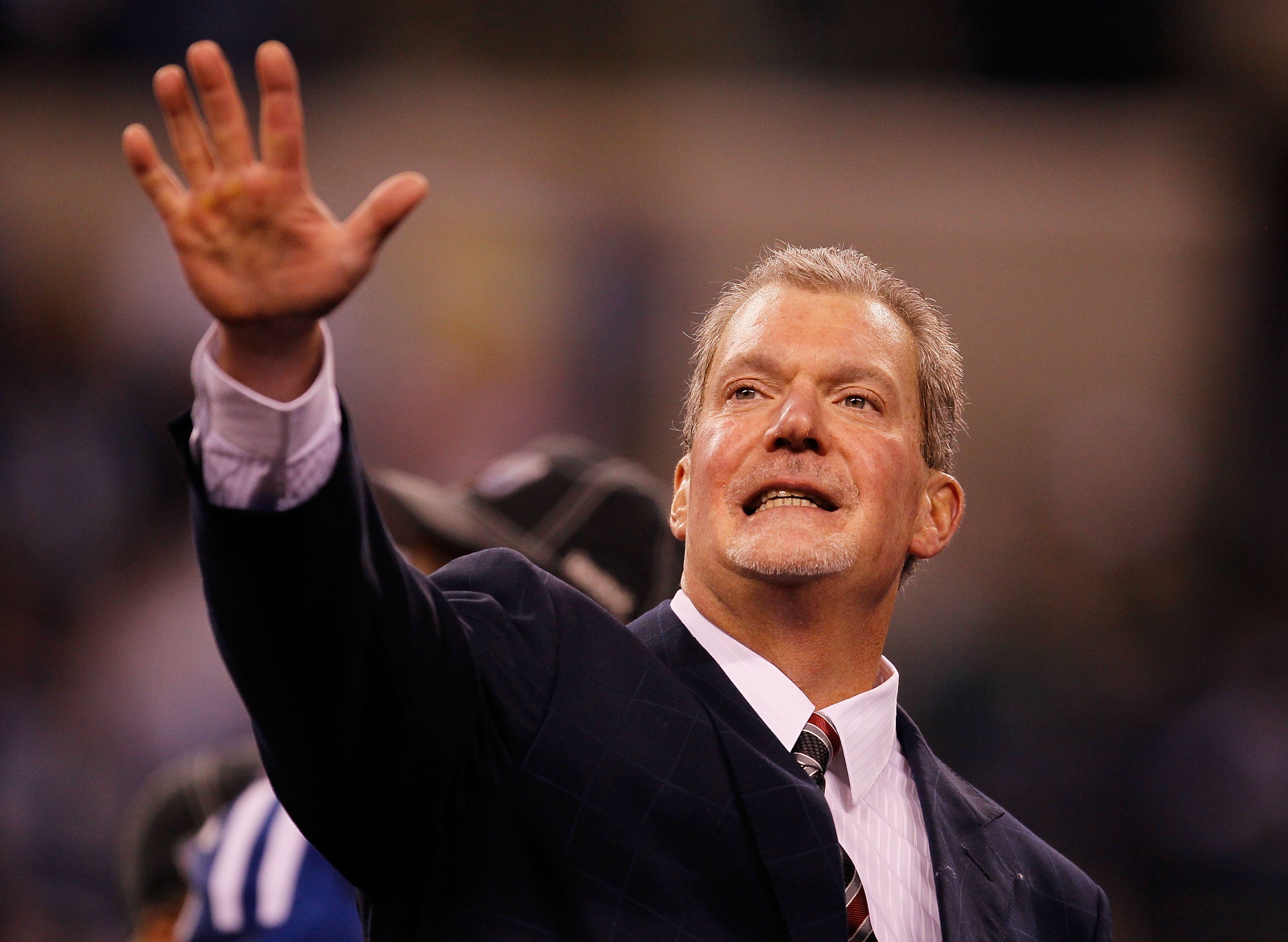 INDIANAPOLIS - JANUARY 24:  Jim Irsay Owner of the Indianapolis Colts celebrates their 30-17 victory of the New York Jets during the Lamar Hunt Trophy presentation after the AFC Championship Game at Lucas Oil Stadium on January 24, 2010 in Indianapolis, I