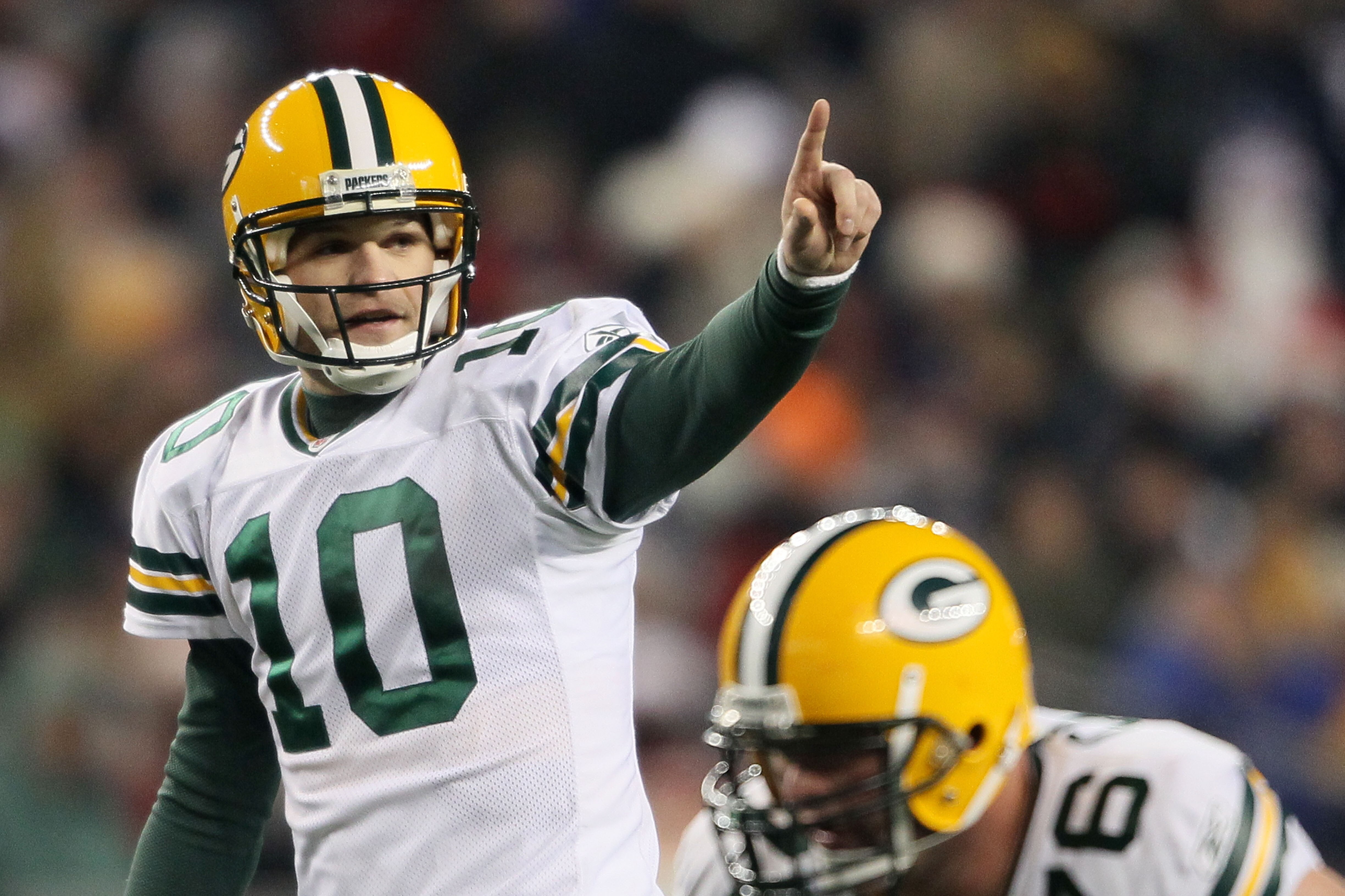 FOXBORO, MA - DECEMBER 19: Quarterback Matt Flynn #10 of the Green Bay Packers signals during the game against the New England Patriots at Gillette Stadium on December 19, 2010 in Foxboro, Massachusetts. The Patriots won the game 31-27. (Photo by Elsa/G FOXBORO, MA - DECEMBER 19: Quarterback Matt Flynn #10 of the Green Bay Packers signals during the game against the New England Patriots at Gillette Stadium on December 19, 2010 in Foxboro, Massachusetts. The Patriots won the game 31-27. (Photo by Elsa/G