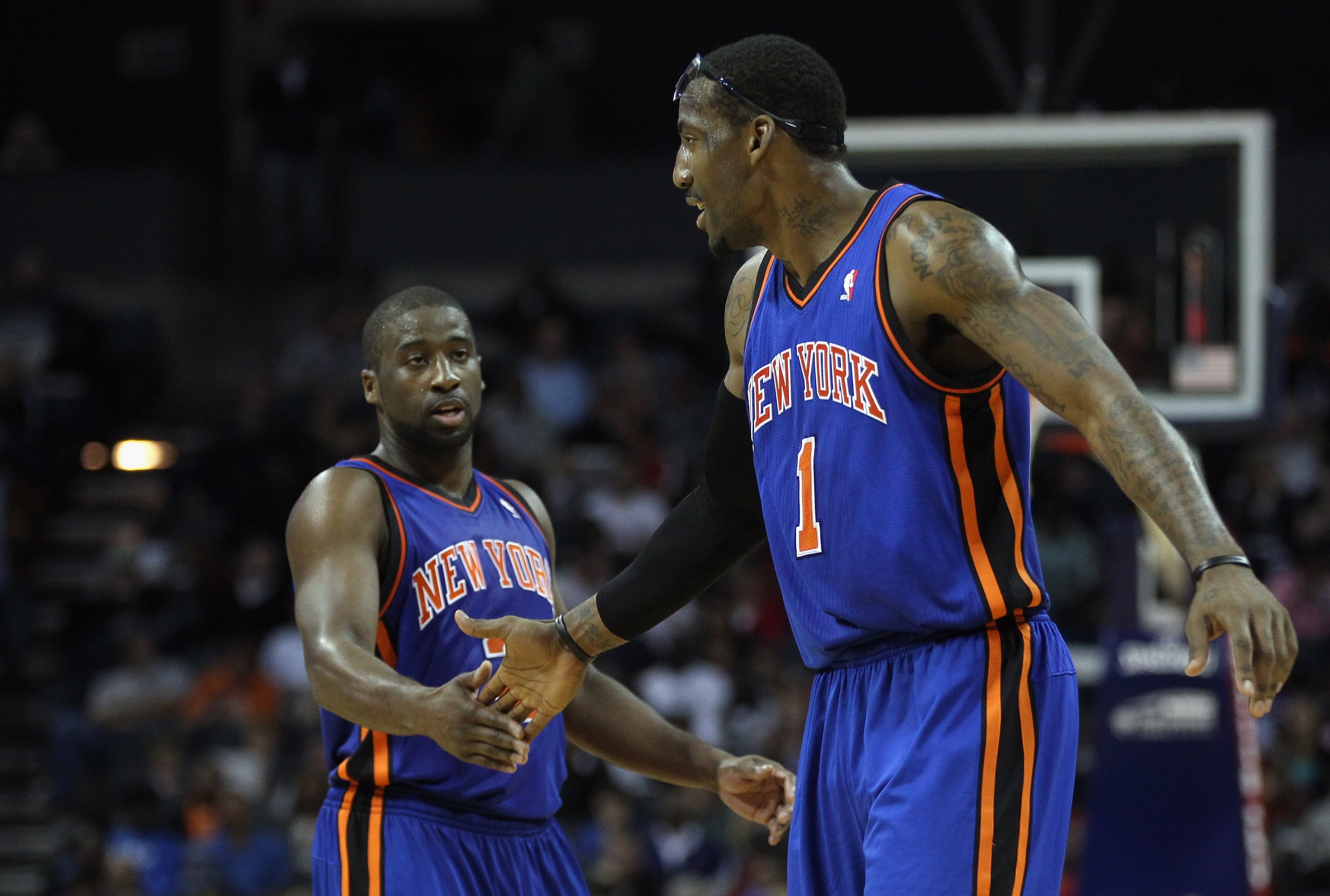 CHARLOTTE, NC - NOVEMBER 24: Amare Stoudemire #1 of the New York Knicks and teammate Raymond Felton #2 react to a call during their game against the Charlotte Bobcats at Time Warner Cable Arena on November 24, 2010 in Charlotte, North Carolina. NOTE TO CHARLOTTE, NC - NOVEMBER 24: Amare Stoudemire #1 of the New York Knicks and teammate Raymond Felton #2 react to a call during their game against the Charlotte Bobcats at Time Warner Cable Arena on November 24, 2010 in Charlotte, North Carolina. NOTE TO