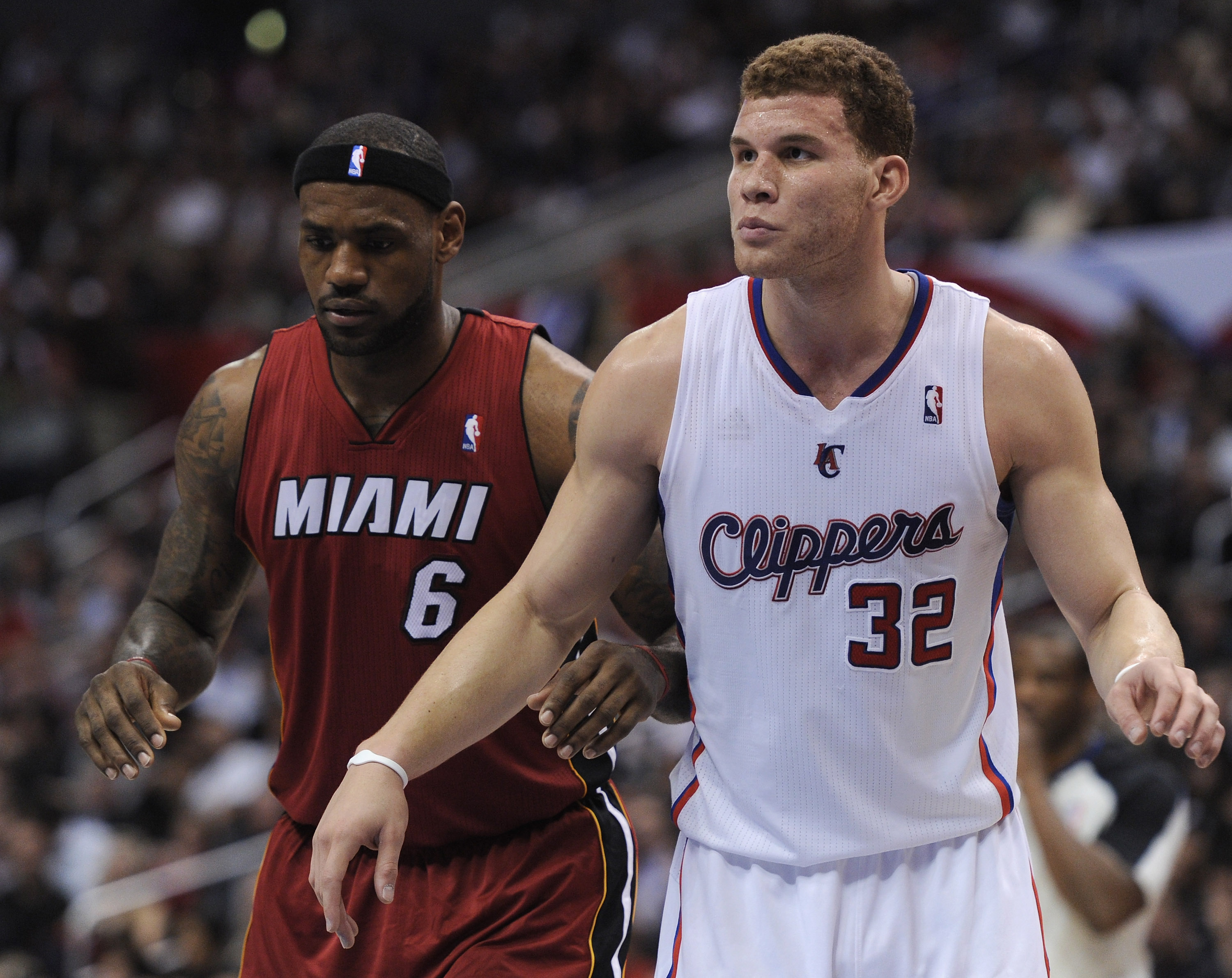 LOS ANGELES, CA - JANUARY 12:  Blake Griffin #32 of the Los Angeles Clippers and LeBron James #6 of  the Miami Heat wait at during a free throw during the first half at the Staples Center on January 12, 2011 in Los Angeles, California.  NOTE TO USER: User