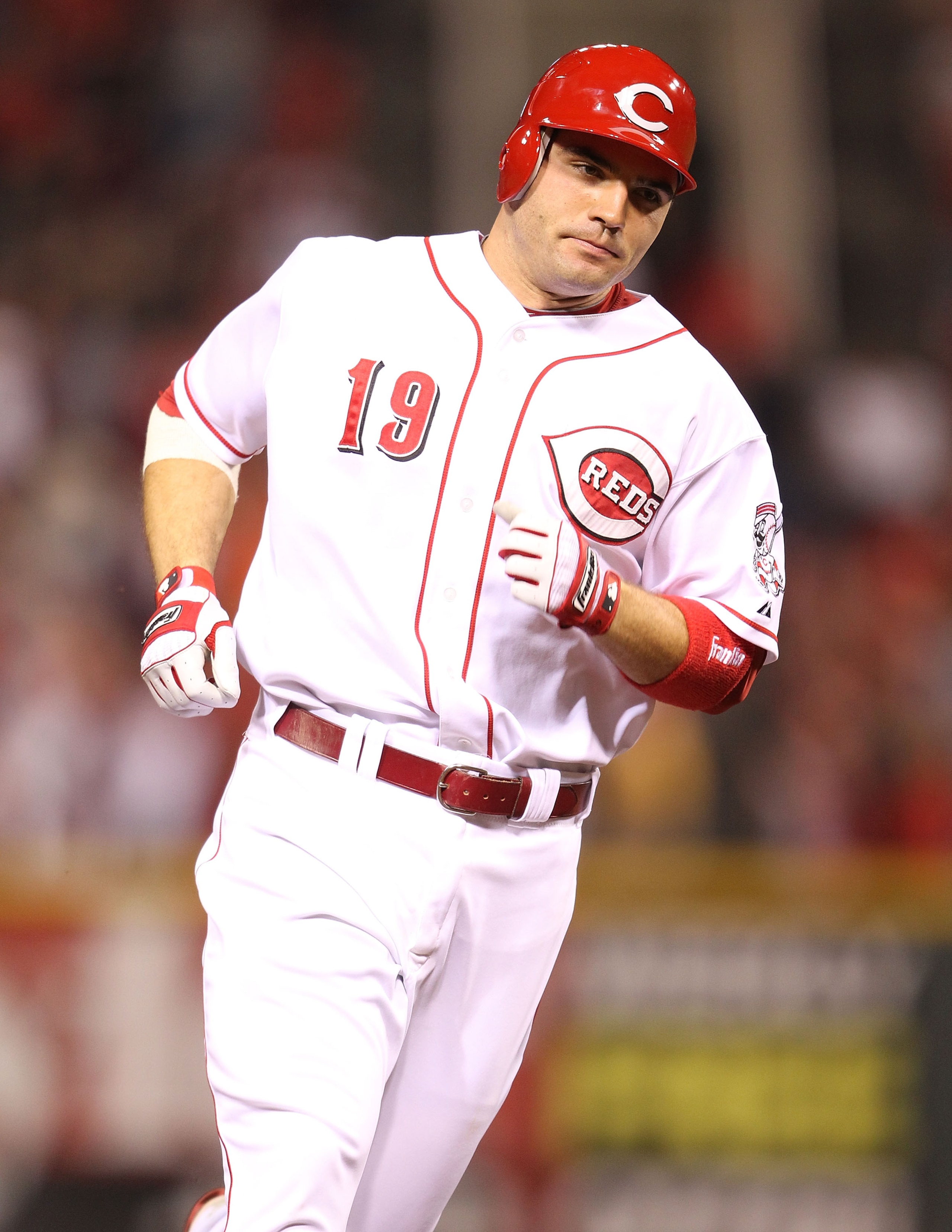 CINCINNATI - SEPTEMBER 11:  Joey Votto #19 of the Cincinnati Reds runs the bases after hitting a game winning home run during the game against the Pittsburg Pirates at Great American Ball Park on September 11, 2010 in Cincinnati, Ohio. The Reds won 5-4  (