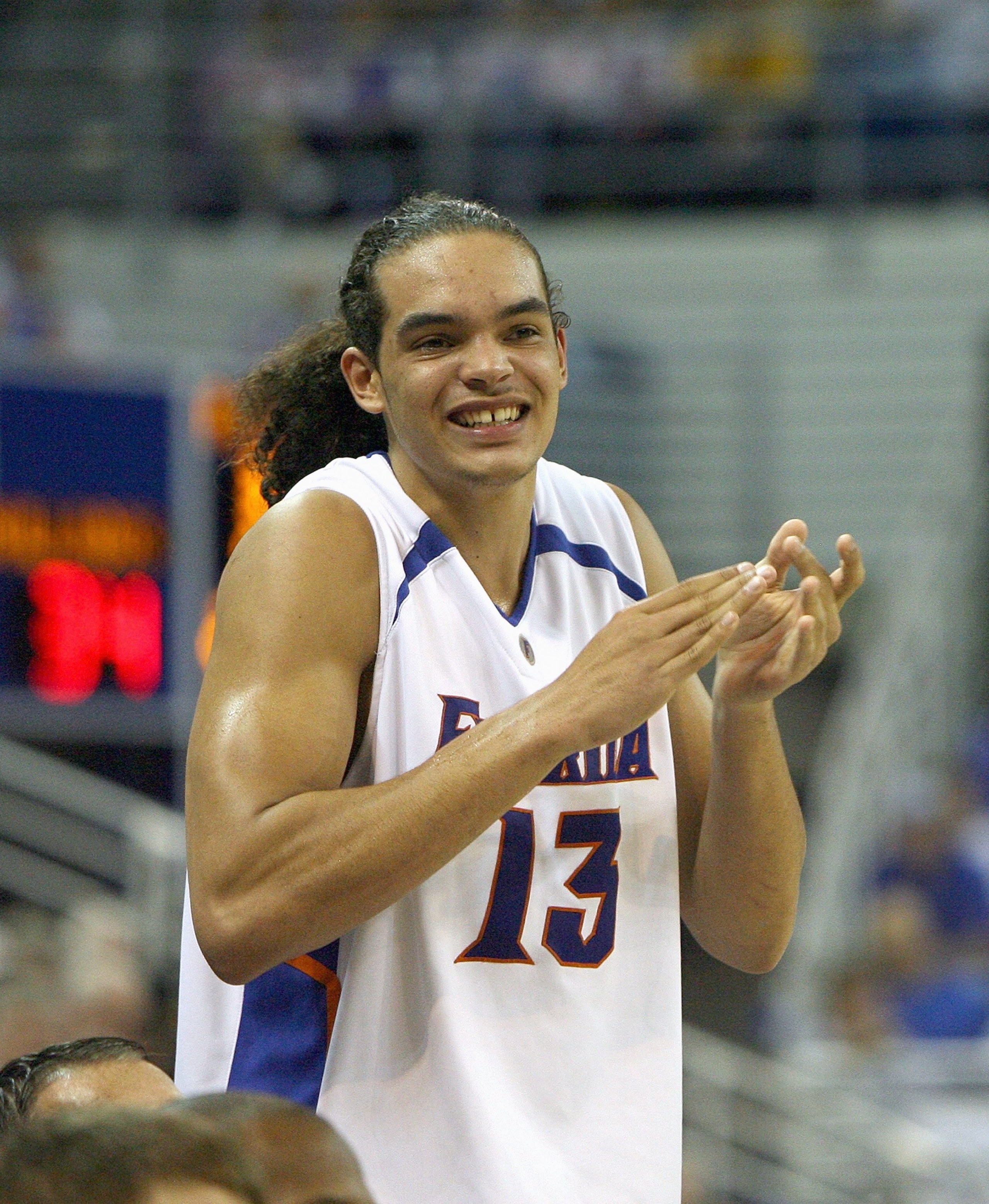 GAINESVILLE, FL - NOVEMBER 10:  Joakim Noah #13 of the University of Florida Gators celebrates on the bench during the game against the Samford Bulldogs at the O'Connell Center on November 10, 2006 in Gainesville, Florida. Florida defeated Samford 79-54.