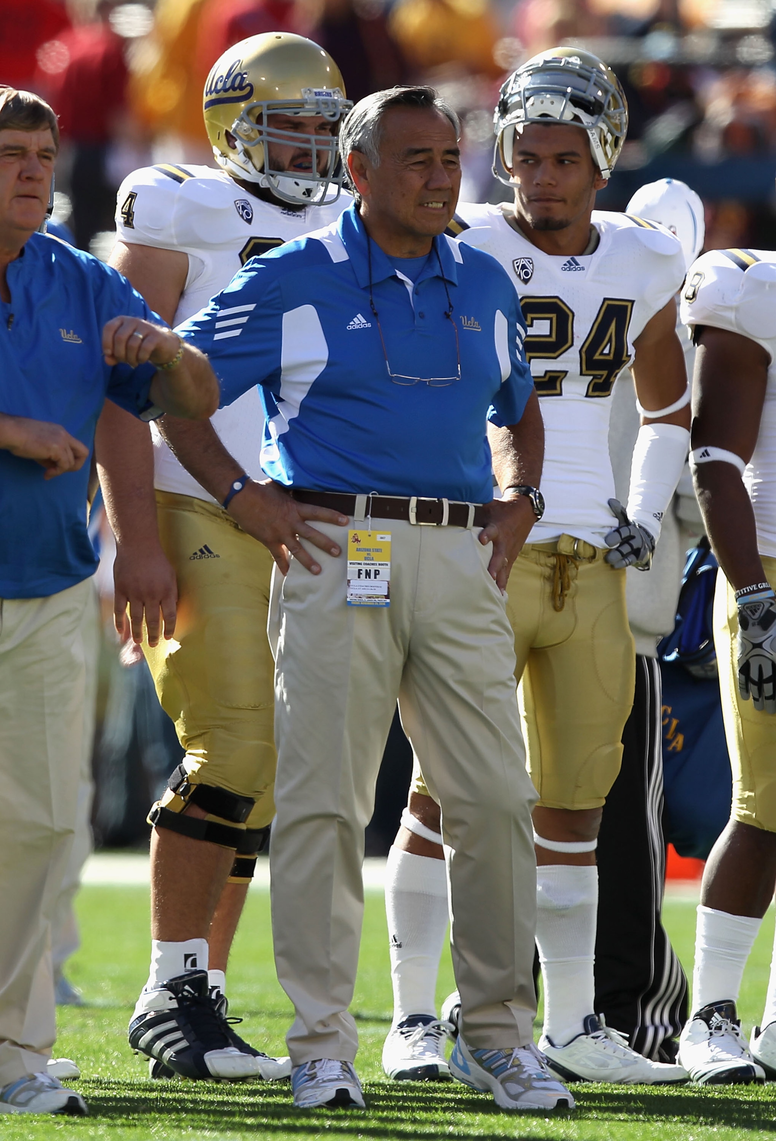 TEMPE, AZ - NOVEMBER 26:  Offensive coordinator Norm Chow of the UCLA Bruins watches warm ups before the college football game against the Arizona State Sun Devils at Sun Devil Stadium on November 26, 2010 in Tempe, Arizona.  (Photo by Christian Petersen/