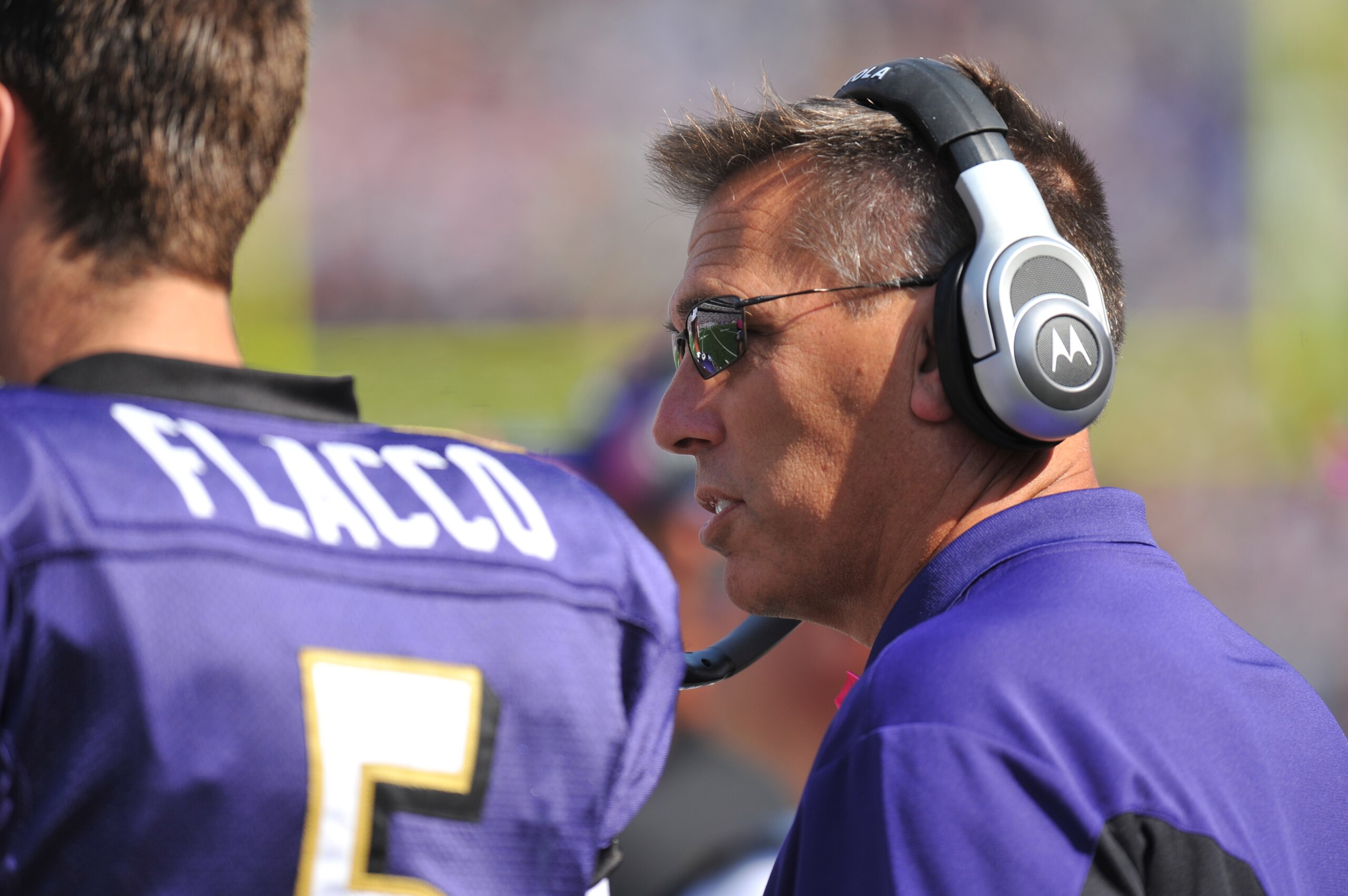 BALTIMORE, MD - OCTOBER 10: Quarterbacks coach Jim Zorn of the Baltimore Ravens coaches against the Denver Broncos at M&T Bank Stadium on October 10, 2010 in Baltimore, Maryland. Players wore pink in recognition of Breast Cancer Awareness Month. The Raven