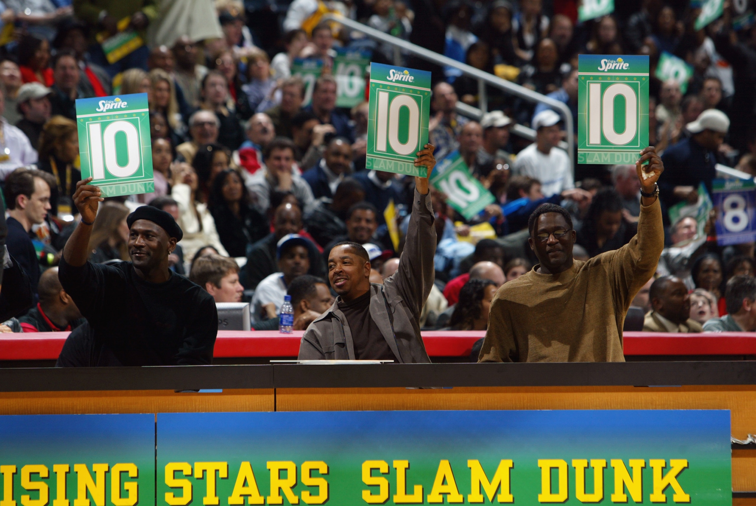 ATLANTA - FEBRUARY 8:  (L-R) Michael Jordan, Anthony 'Spud' Webb, and Dominique Wilkins judge the Sprite Rising Stars Slam Dunk Contest during the 2003 NBA All-Star Weekend at Philips Arena on February 8, 2003 in Atlanta, Georgia.  NOTE TO USER: User expr